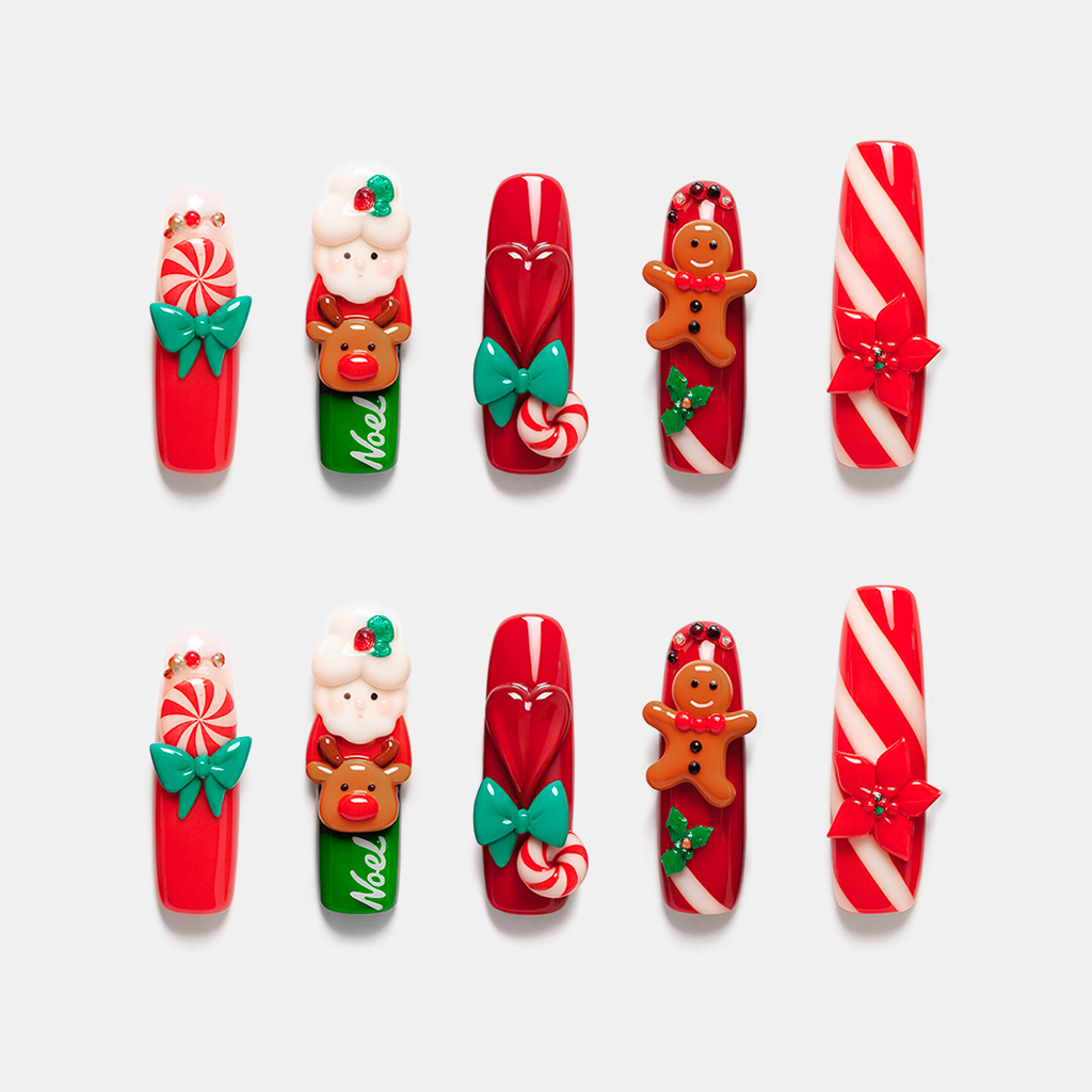 Holiday Dolls – red and green Christmas press-on nails with Santa, reindeer, candy cane, and gingerbread details