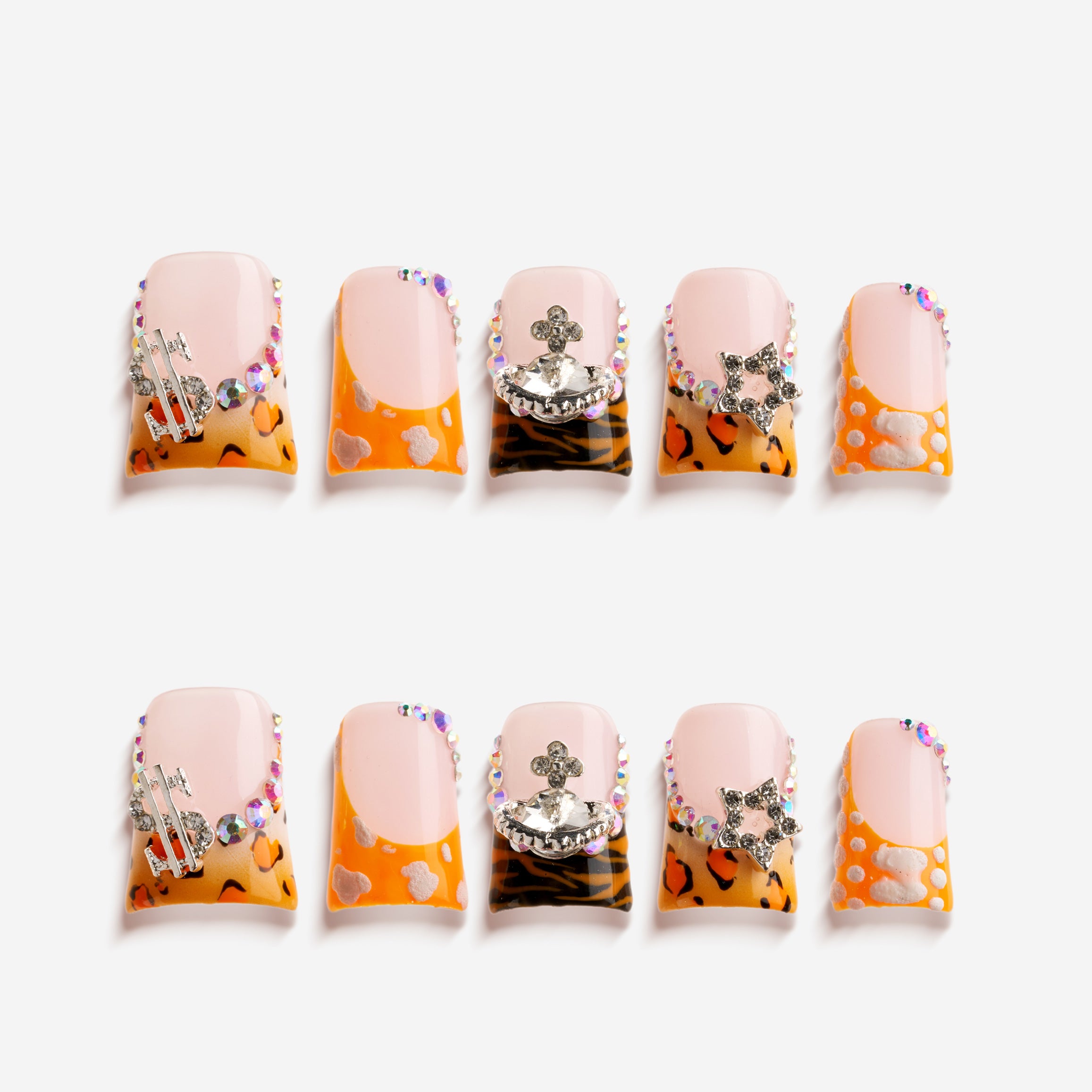 Butterfly mirage press on nails with leopard prints, pastel tips, rhinestones, and silver butterfly charms.