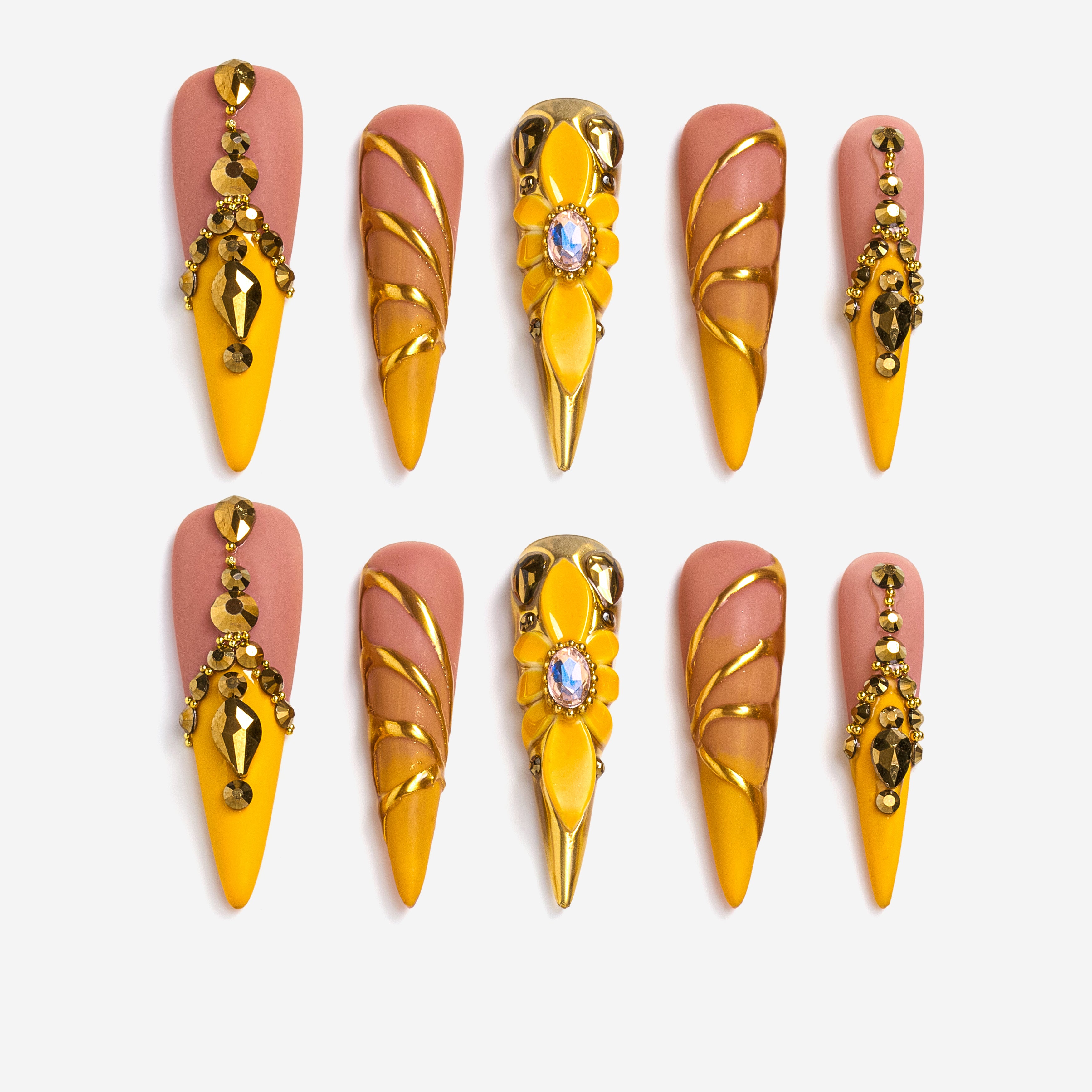 Luxury gold butterfly press on nails with gemstone accents. Dramatic stiletto shape and reusable salon finish.