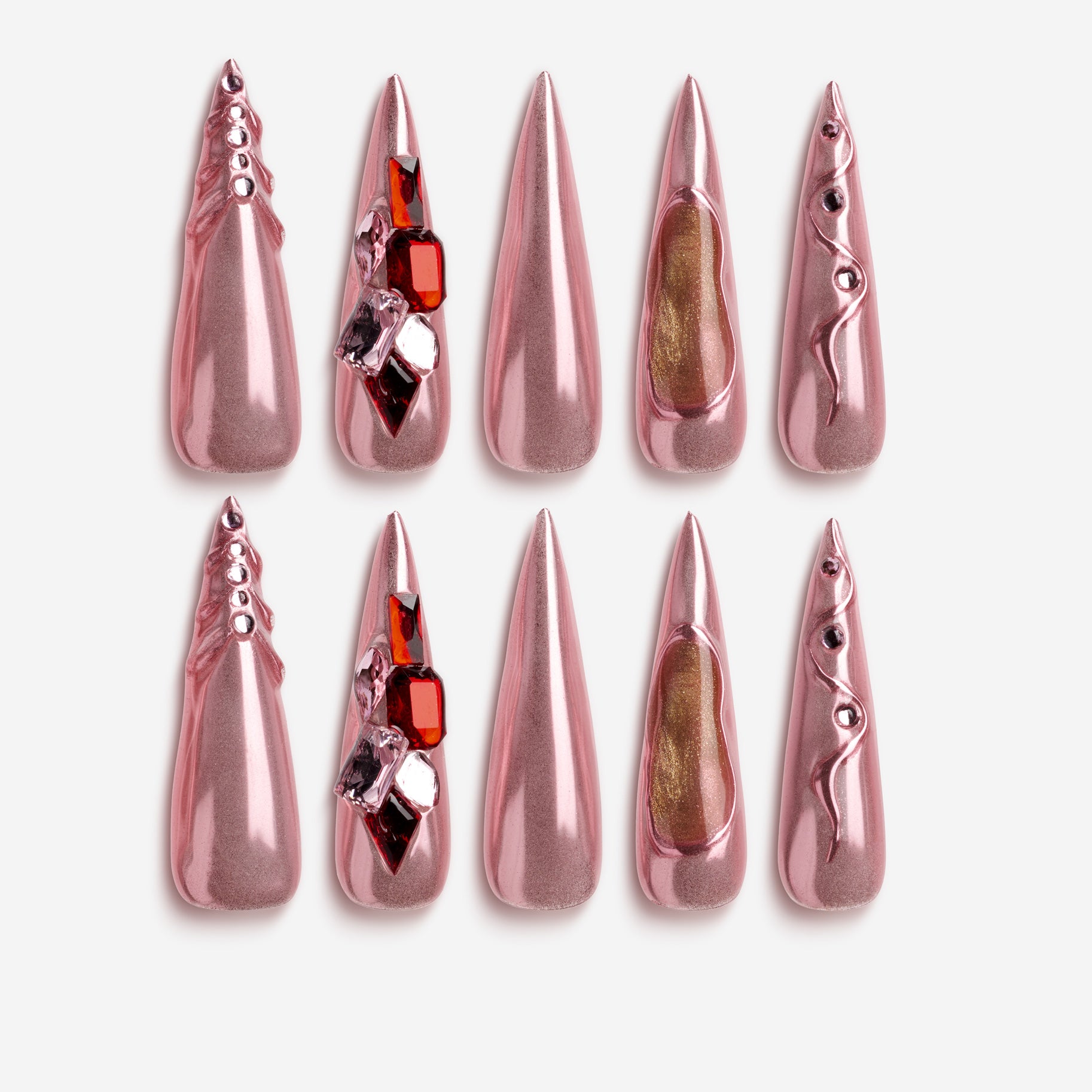 Rose Gold Dream – metallic rose gold Christmas press-on nails with 3D textures and snowflake design