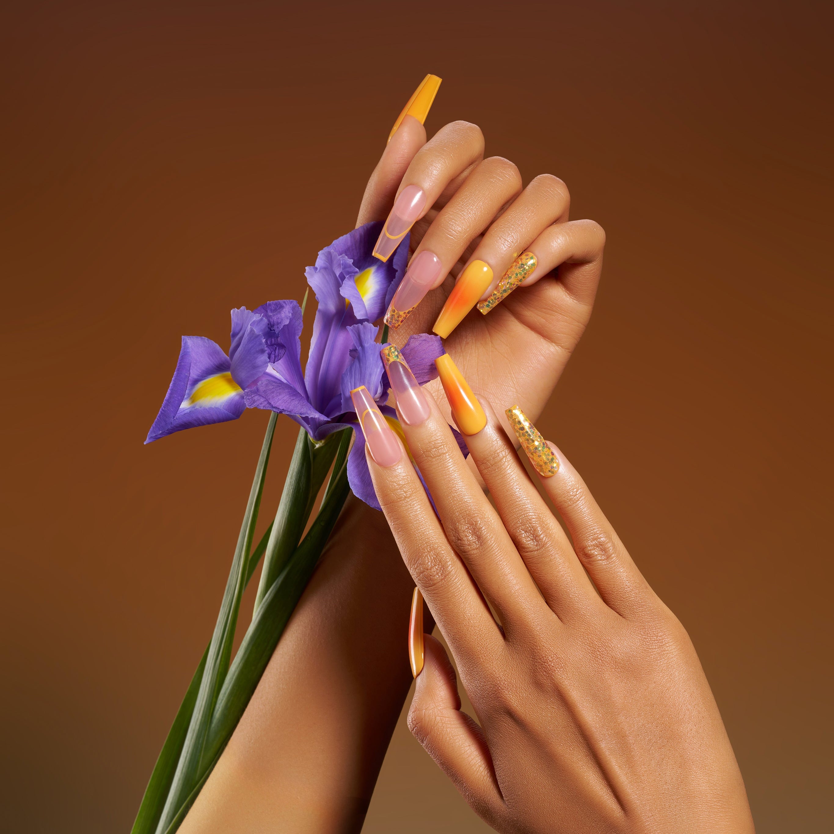 Warm amber gradient press on nails inspired by sunset tones. Glossy, elegant and reusable.