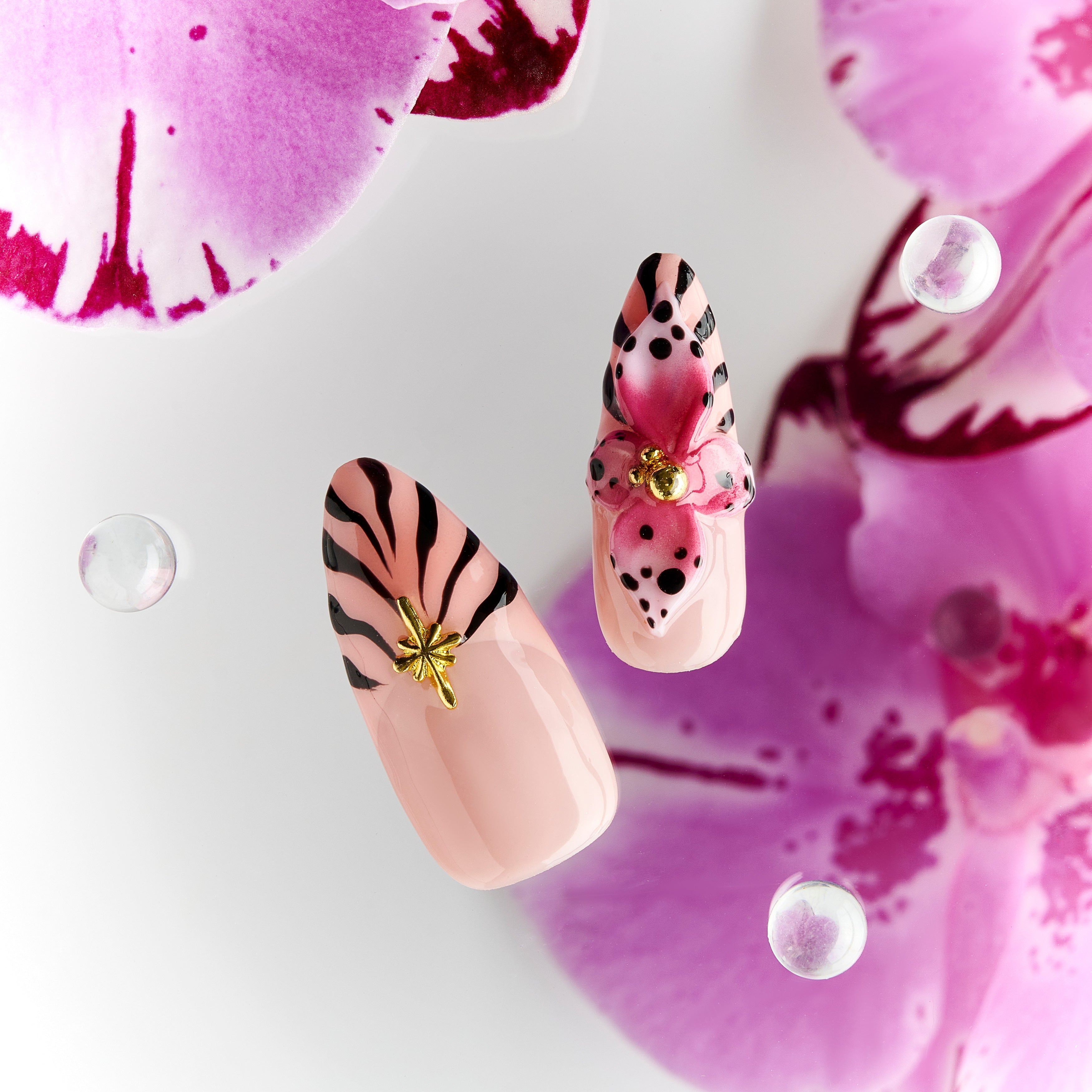 Warm neutral press on nails with gold and crystal details. Handmade reusable nail art set for everyday elegance.