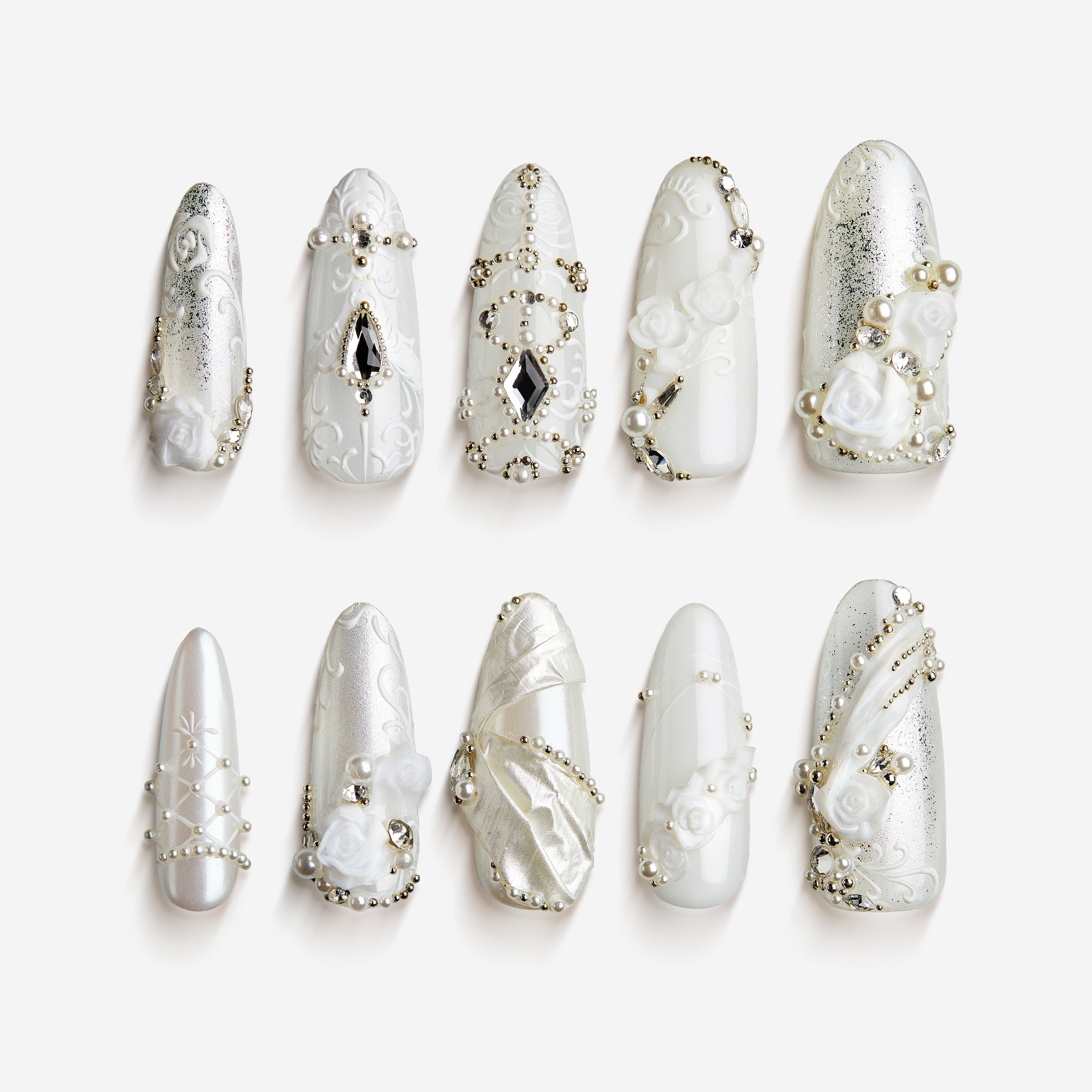 Elegant white wedding press on nails with pearl and crystal accents by BOXNAIL. Timeless bridal manicure for ceremonies and receptions.