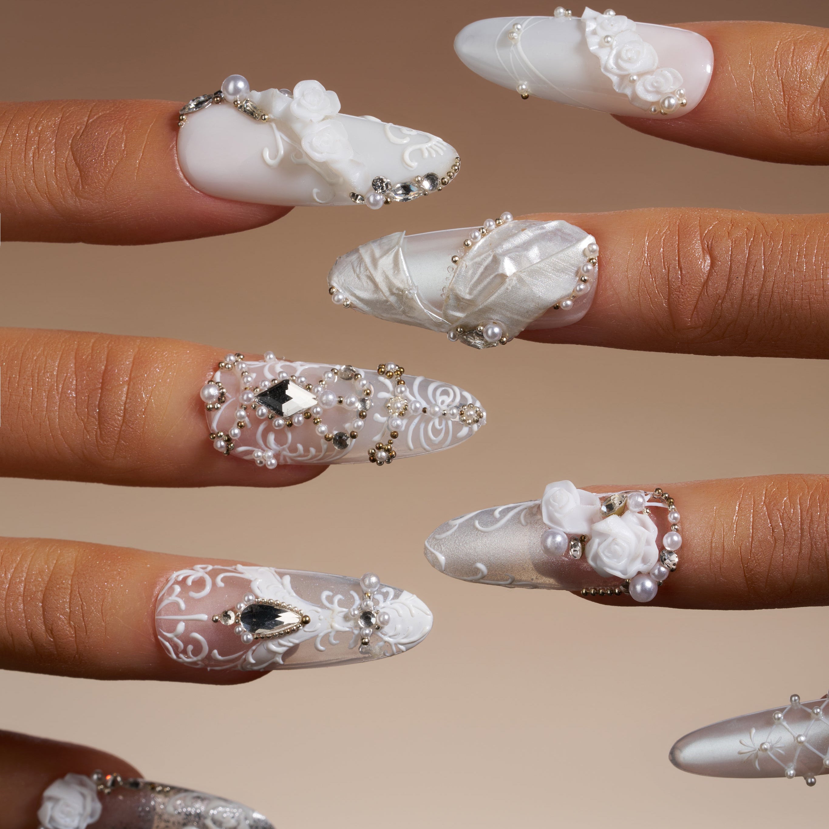 Elegant white wedding press on nails with pearl and crystal accents by BOXNAIL. Timeless bridal manicure for ceremonies and receptions.