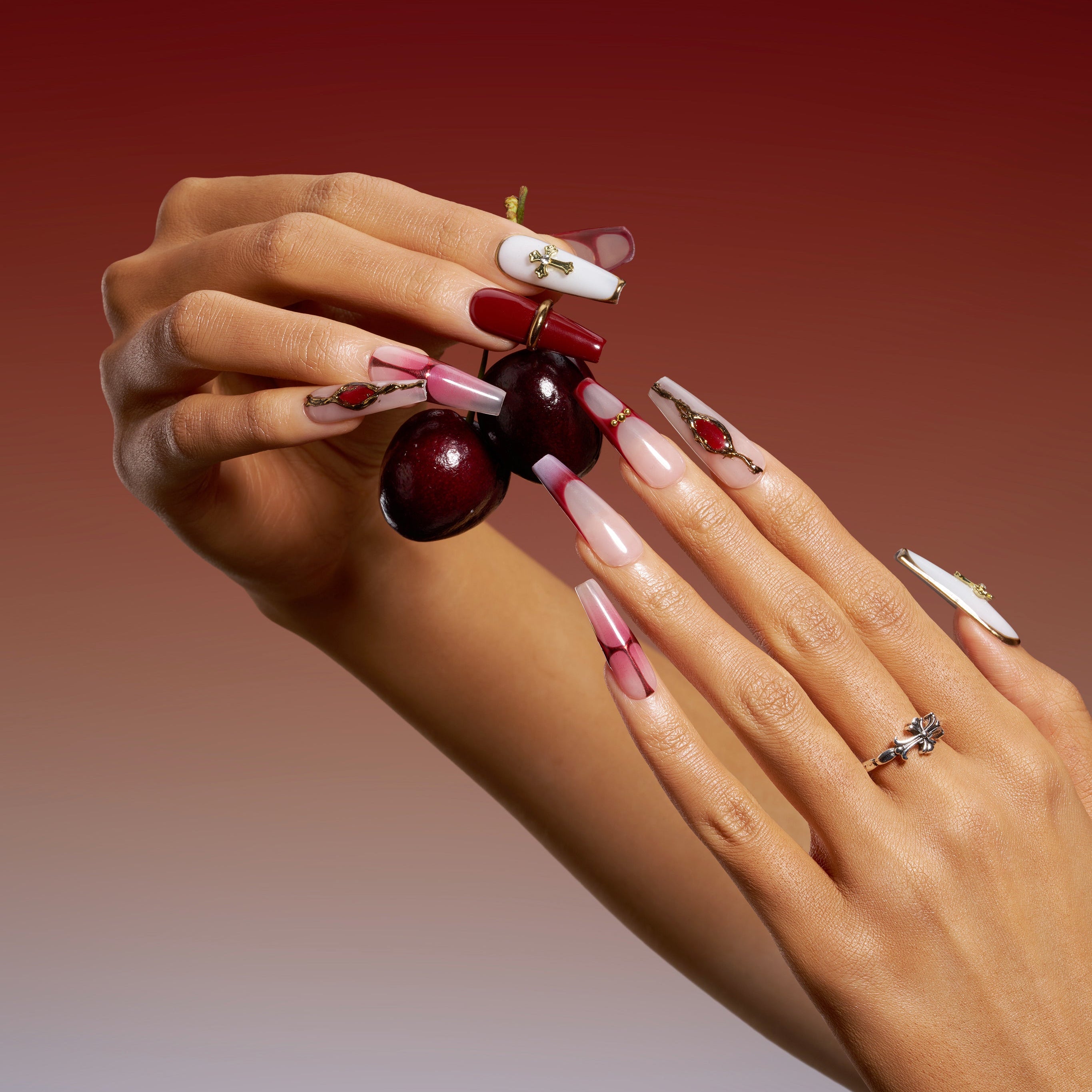 Cold toned coffin press on nails featuring silver chrome waves and blue gradient accents. Futuristic, glossy and reusable.