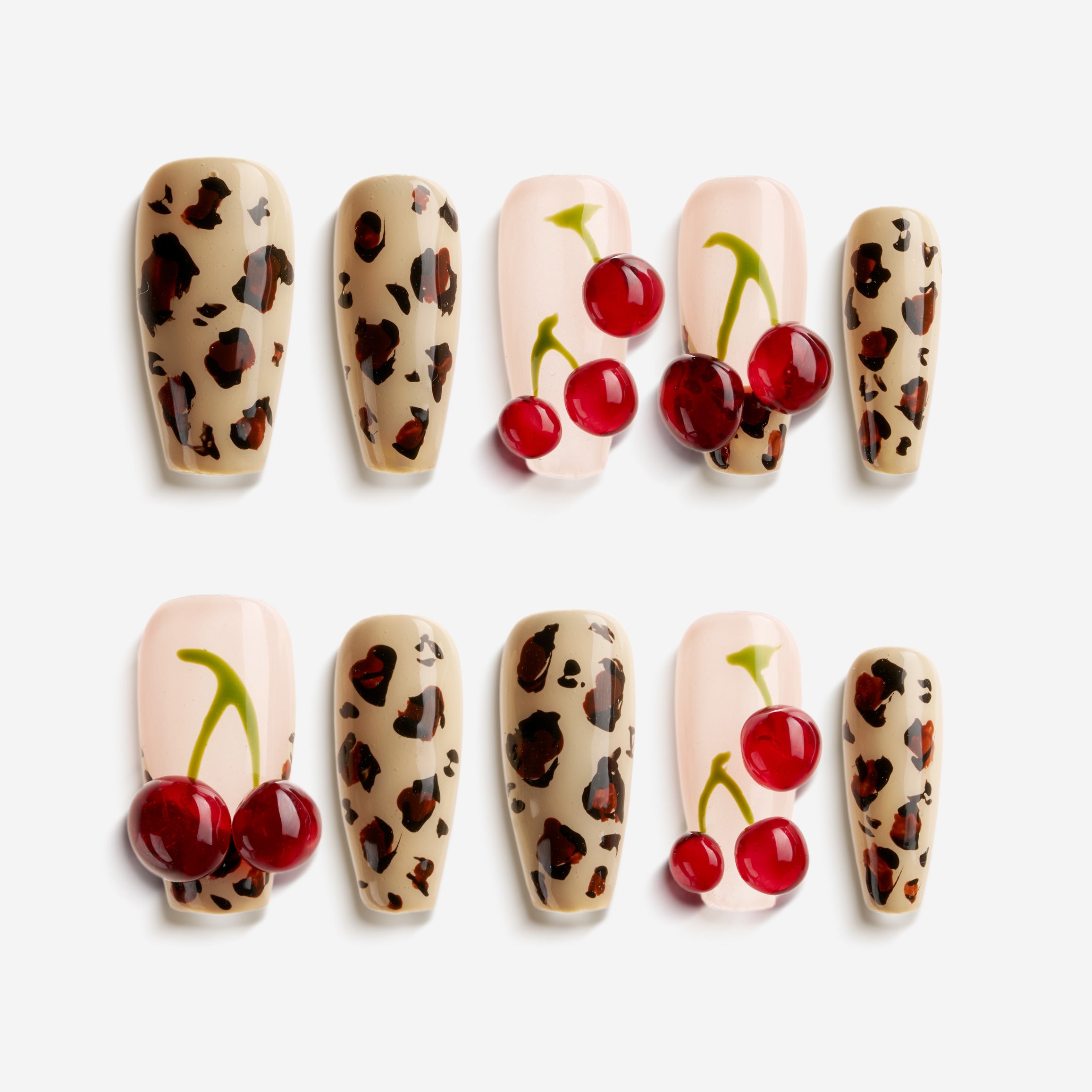 Coffin press on nails with cherry art and brown leopard print on nude and pink base