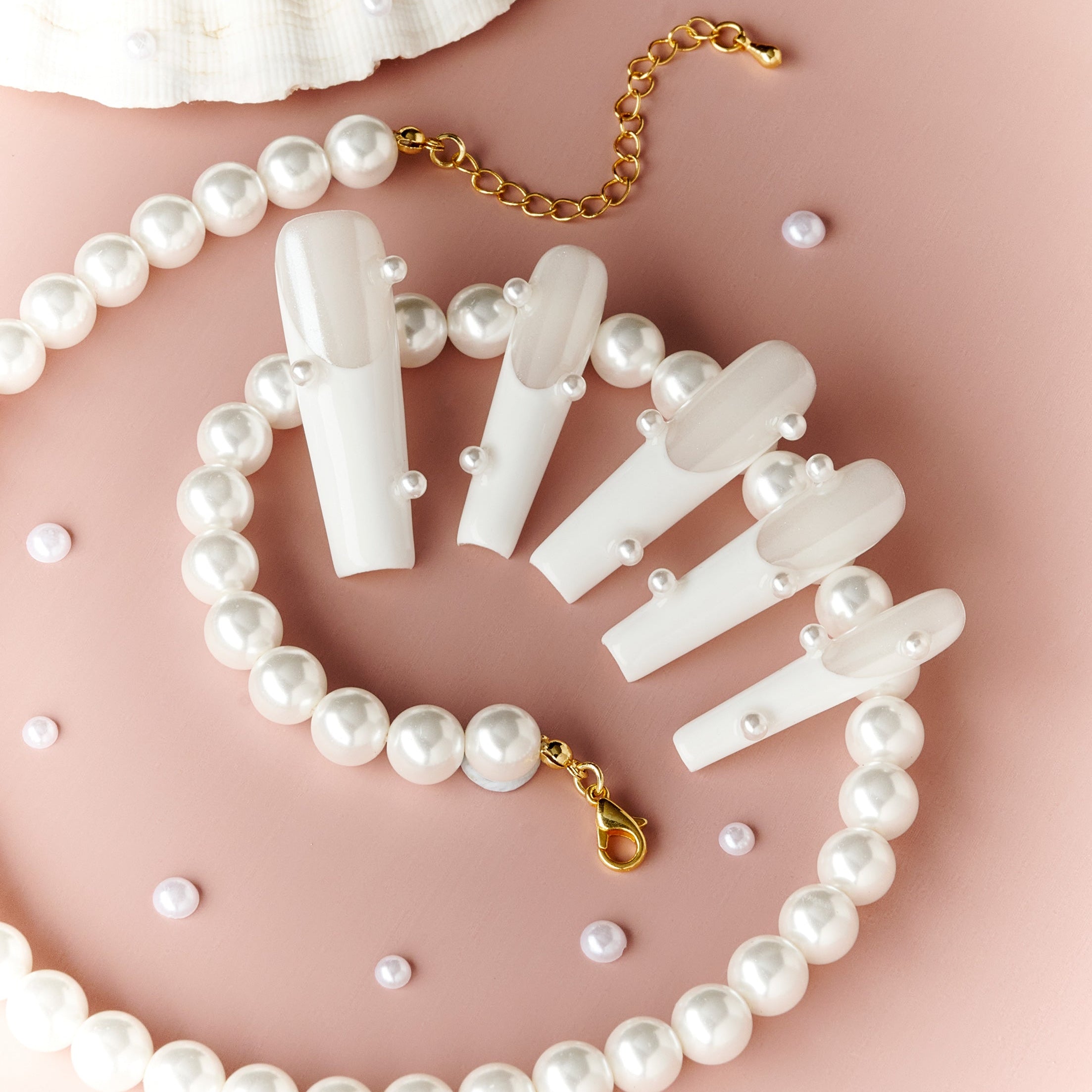 Cloud Porcelain Drop press on nails with milky base and pearl accents