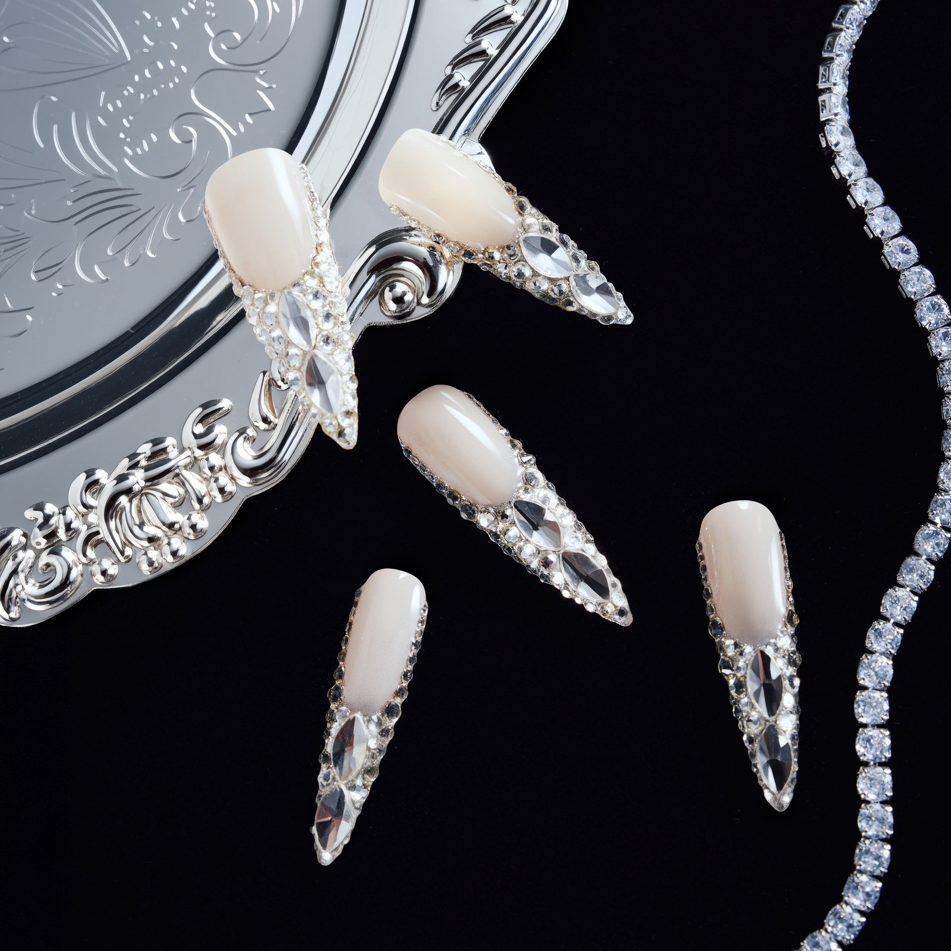 Crystal Wings luxury long press on nails with silver crystals arranged in wing patterns