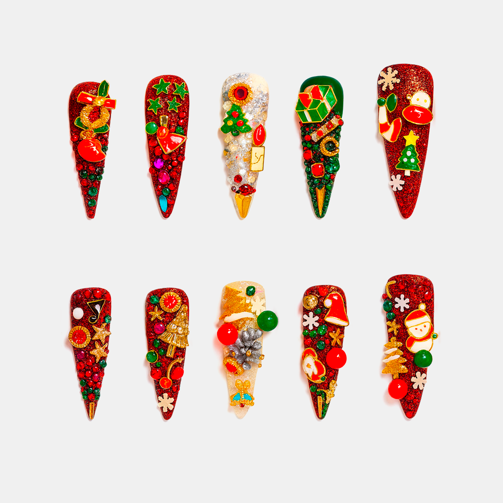 Joyful Gala – glitter red Christmas nails with festive charms, ornaments, and Christmas tree decorations