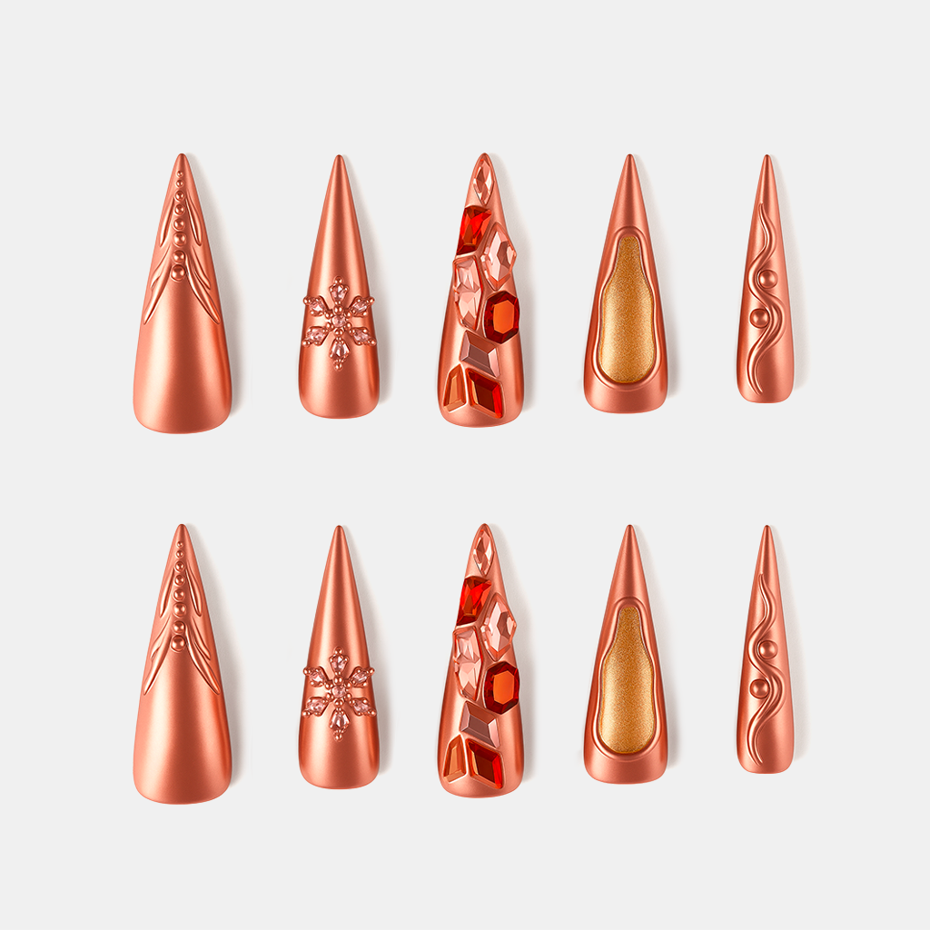 Rose Gold Dream – metallic rose gold Christmas press-on nails with 3D textures and snowflake design