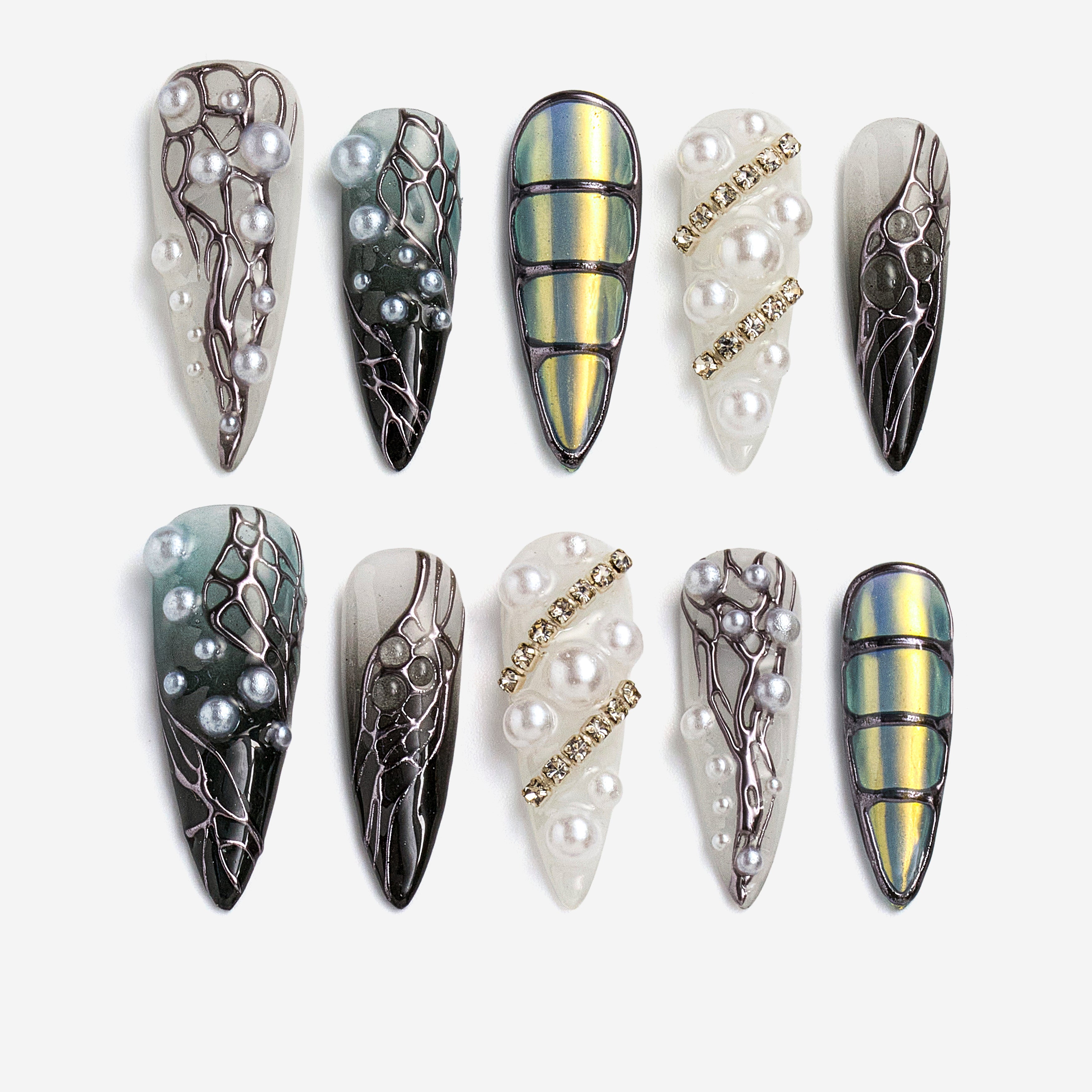 dresup Silver Coral press on nails featuring chrome texture and pearl details. Luxury ocean-inspired false nails.