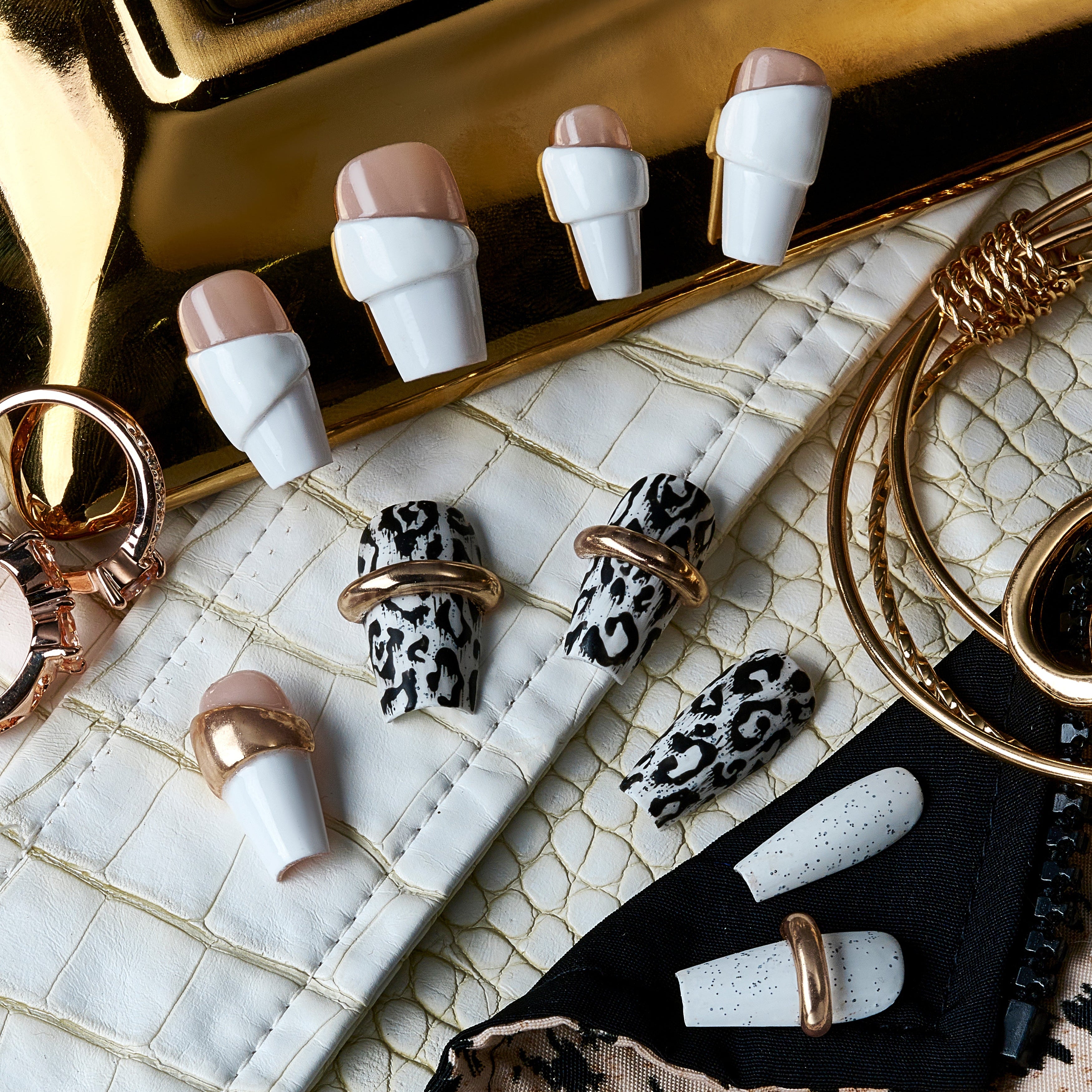 Grey Swirl Gold Band press on nails with minimalist swirl design and gold metal ring accents