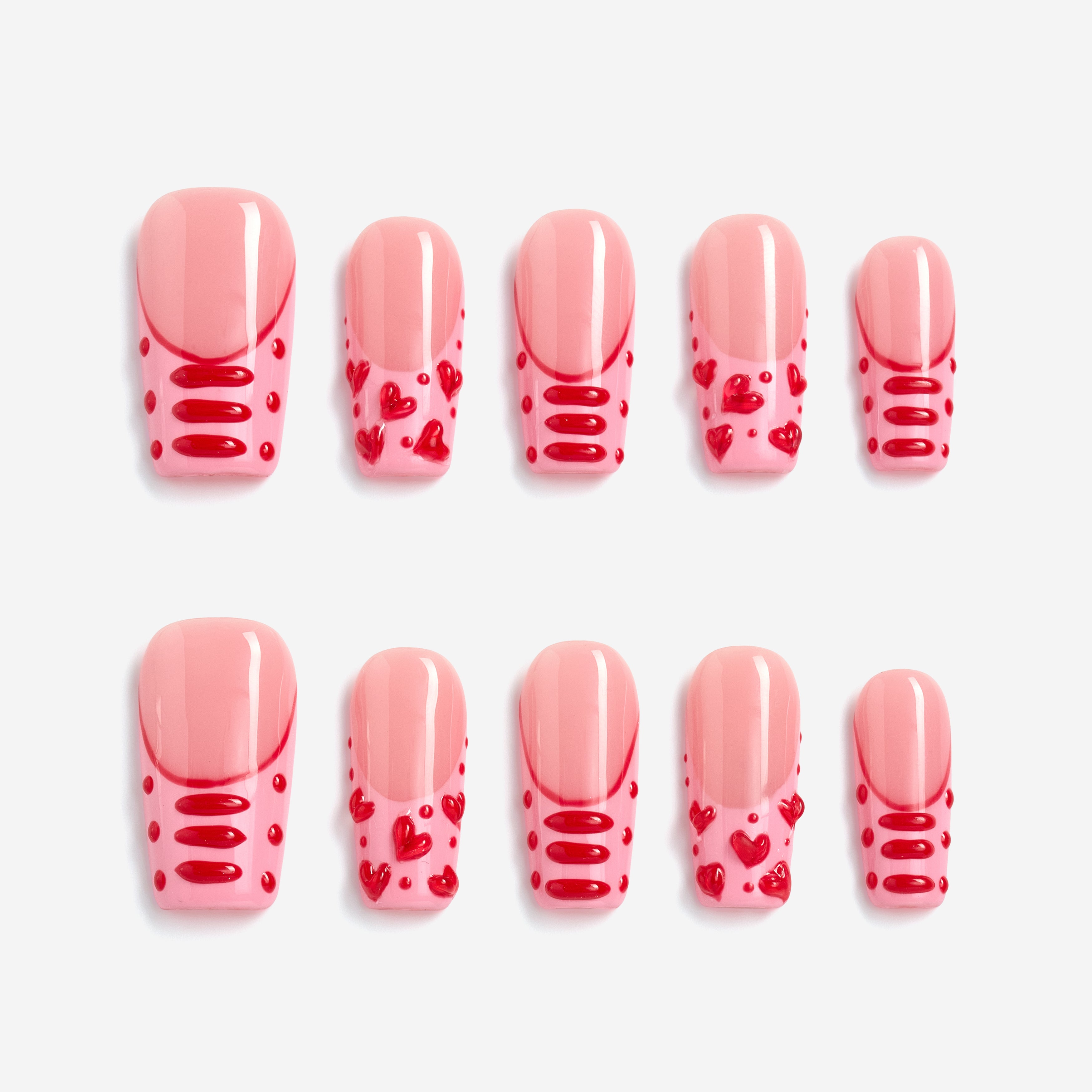 Sweet peach press on nails with 3D heart details. Romantic glossy finish and reusable comfort fit.