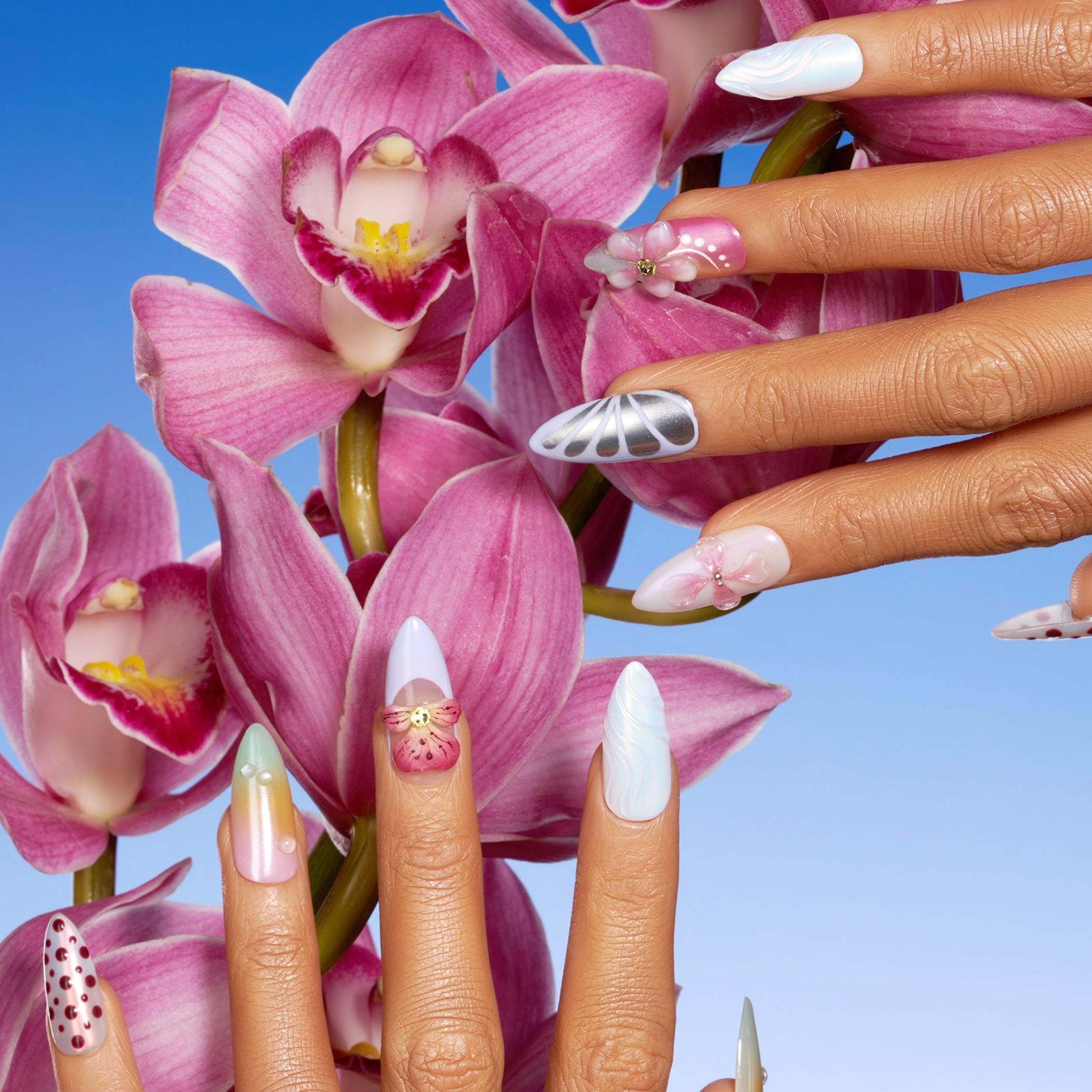 Soft pastel polka dot press on nails with pink and cream tones