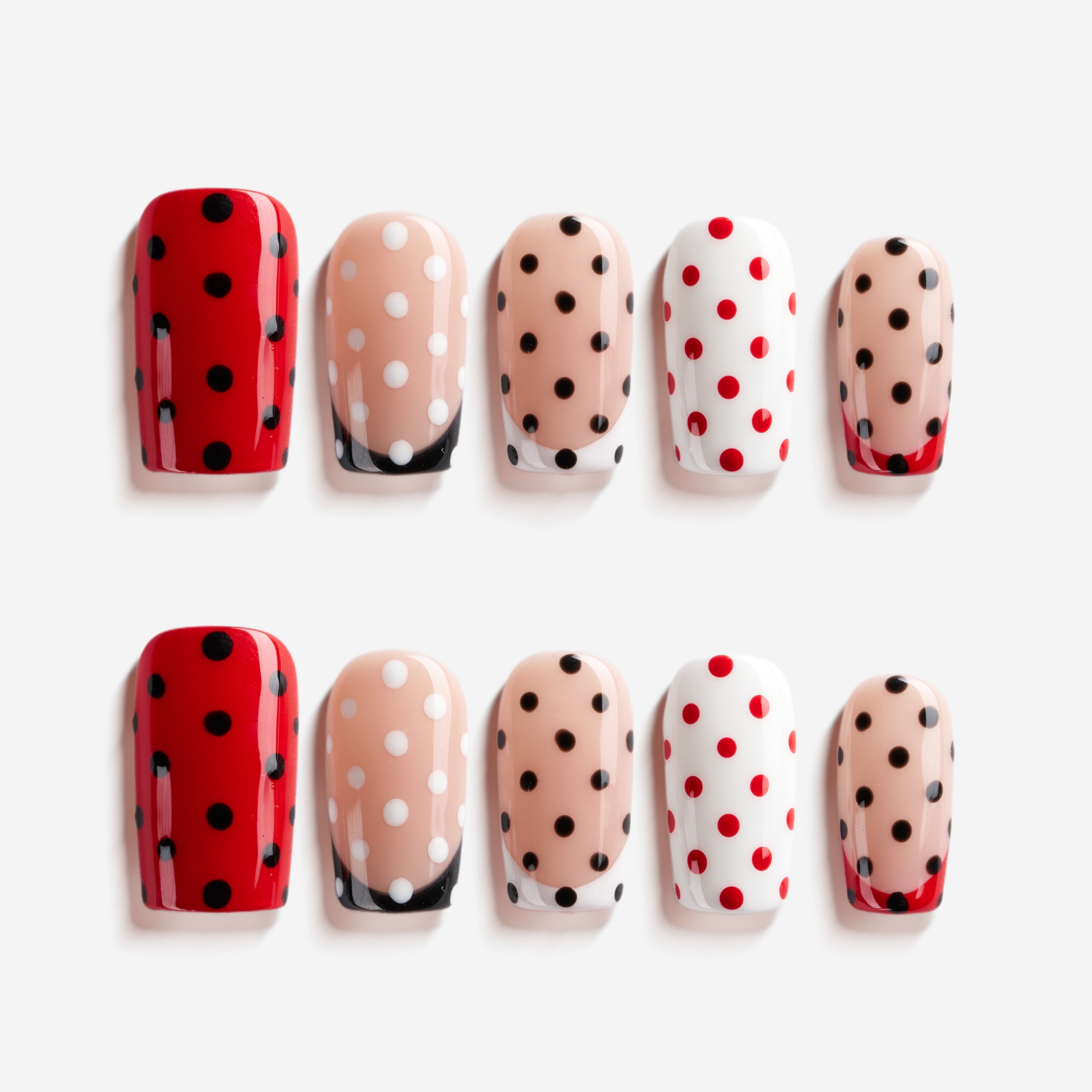 Retro polka dot press on nails in red, nude and white. Fun everyday manicure set.