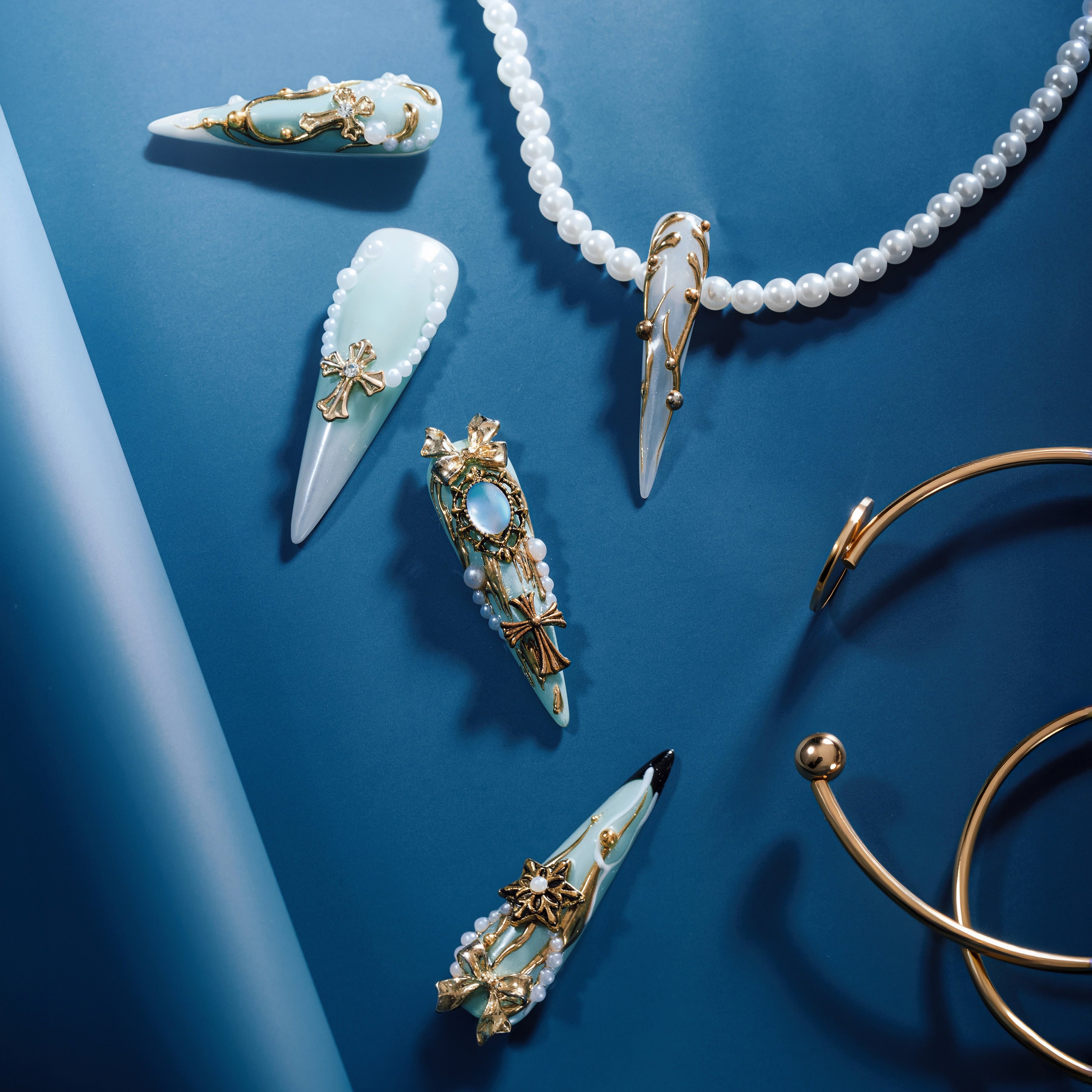 Regal Feather Adornment luxury emerald and white press on nails with gold 3D ornaments, pearls and gemstone details