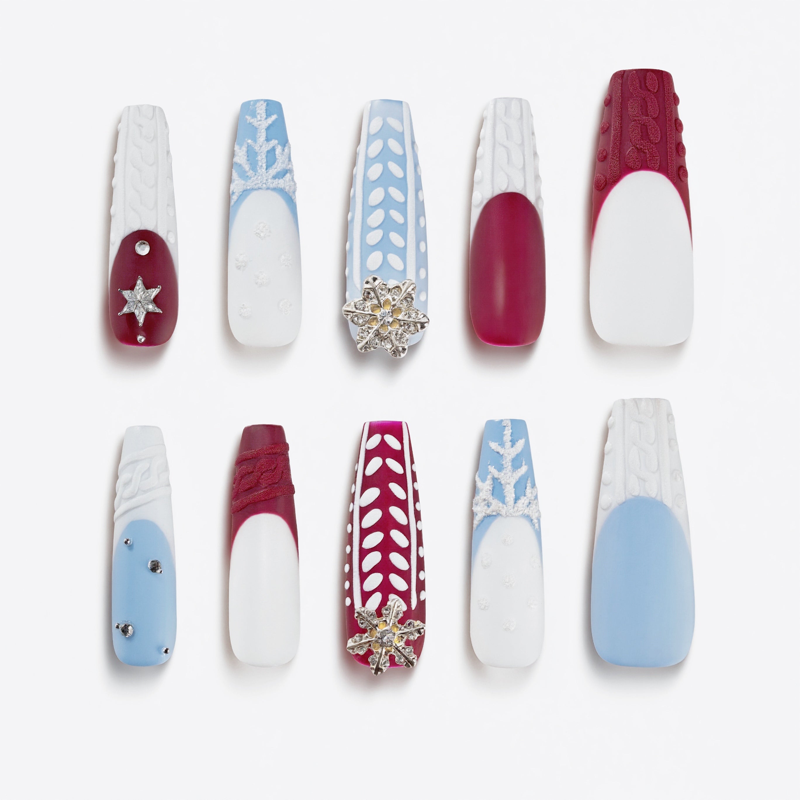 Silver glitter Christmas nails with delicate snowflake charms and frosty shine