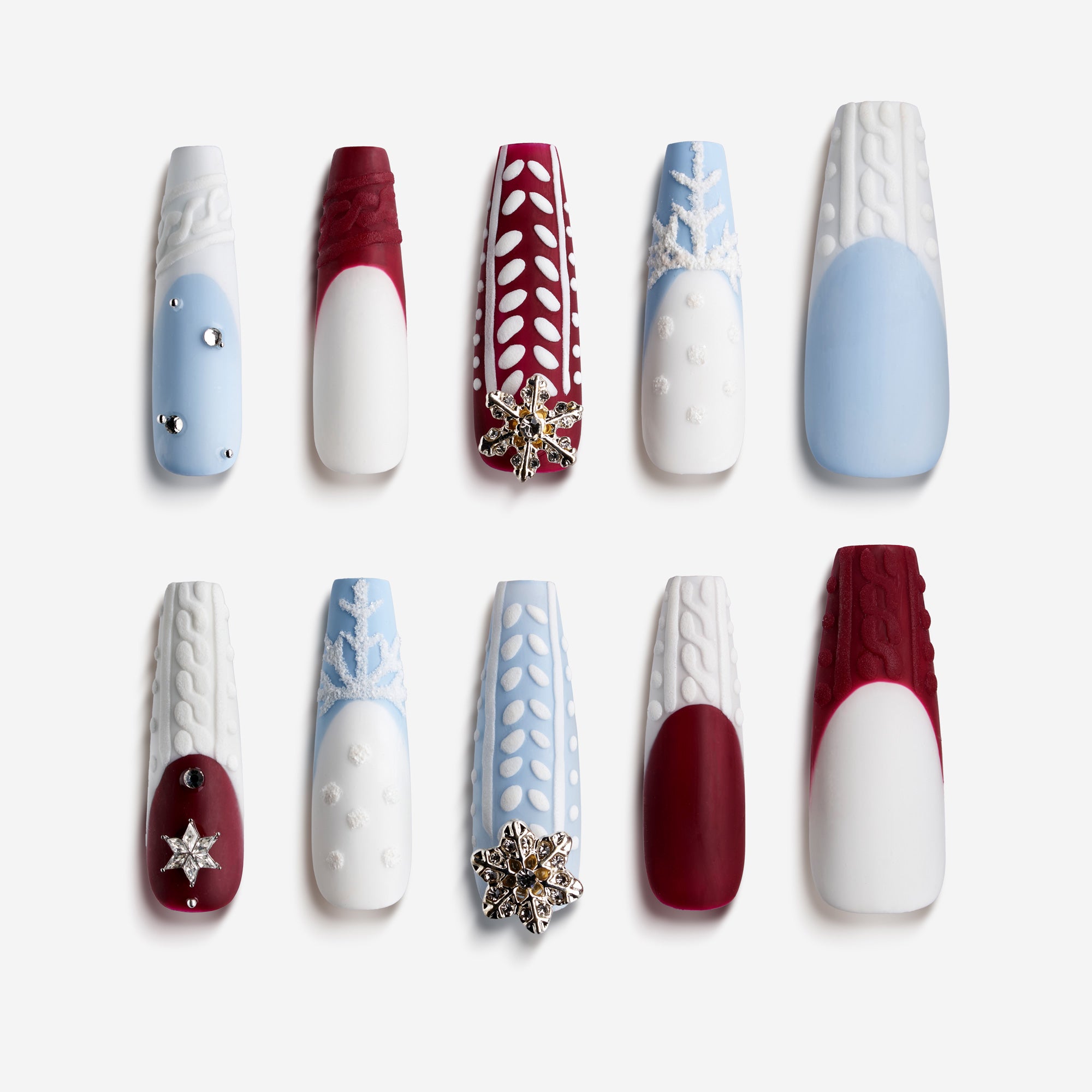 Silver glitter Christmas nails with delicate snowflake charms and frosty shine