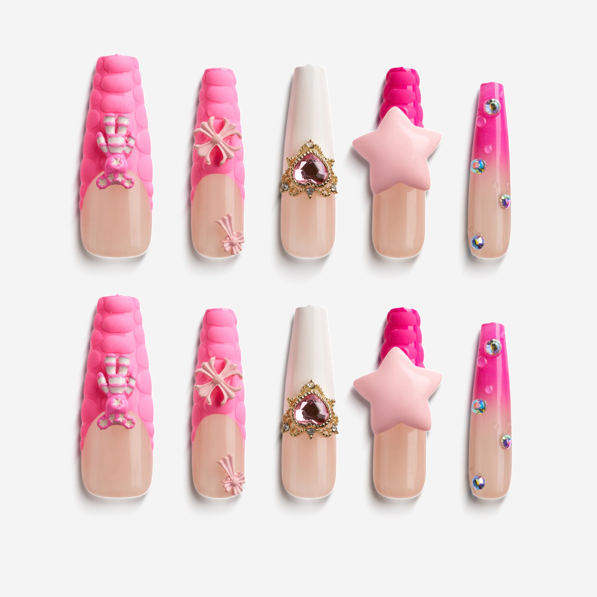 Starry Bear Dream pink press on nails with 3D bow and star embellishments.