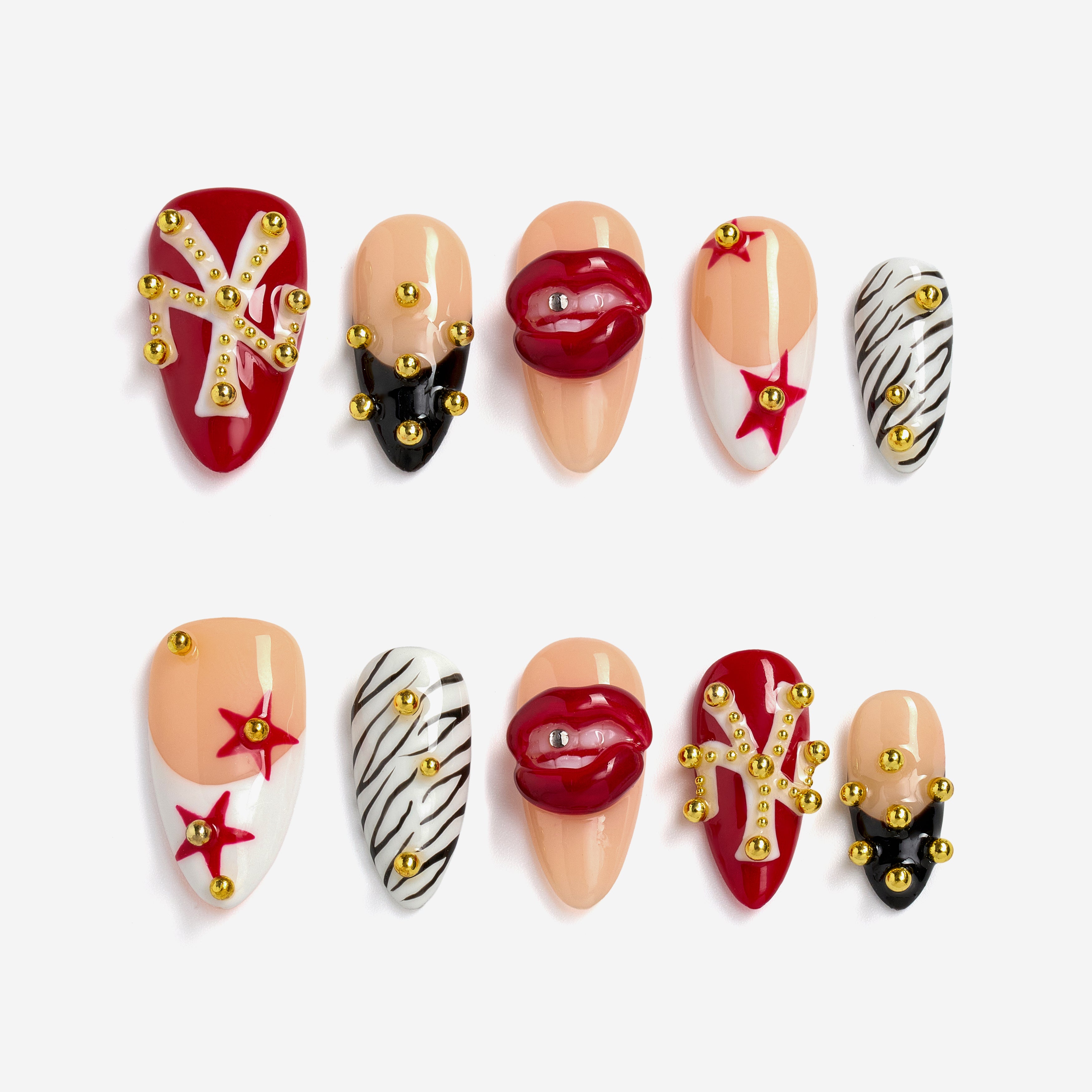 Artistic press on nails with sculpted red lips and studded details. Handmade reusable nail art set with bold style.