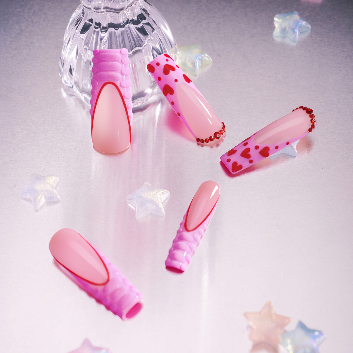 Pink flutter press on nails with heart tips and textured pink 3D edges, long coffin nails, cute valentine style.