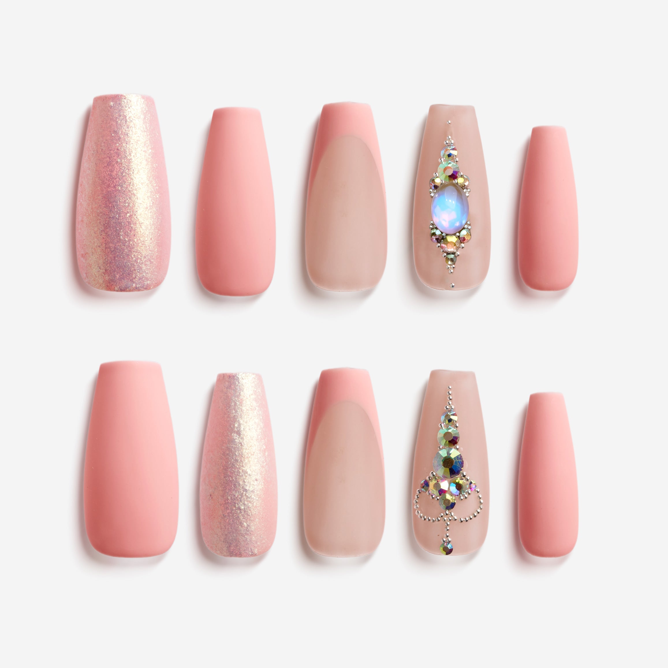 Pink sparkle elegance press on nails with shimmer glitter, nude pink tones, and rhinestone accent nail.