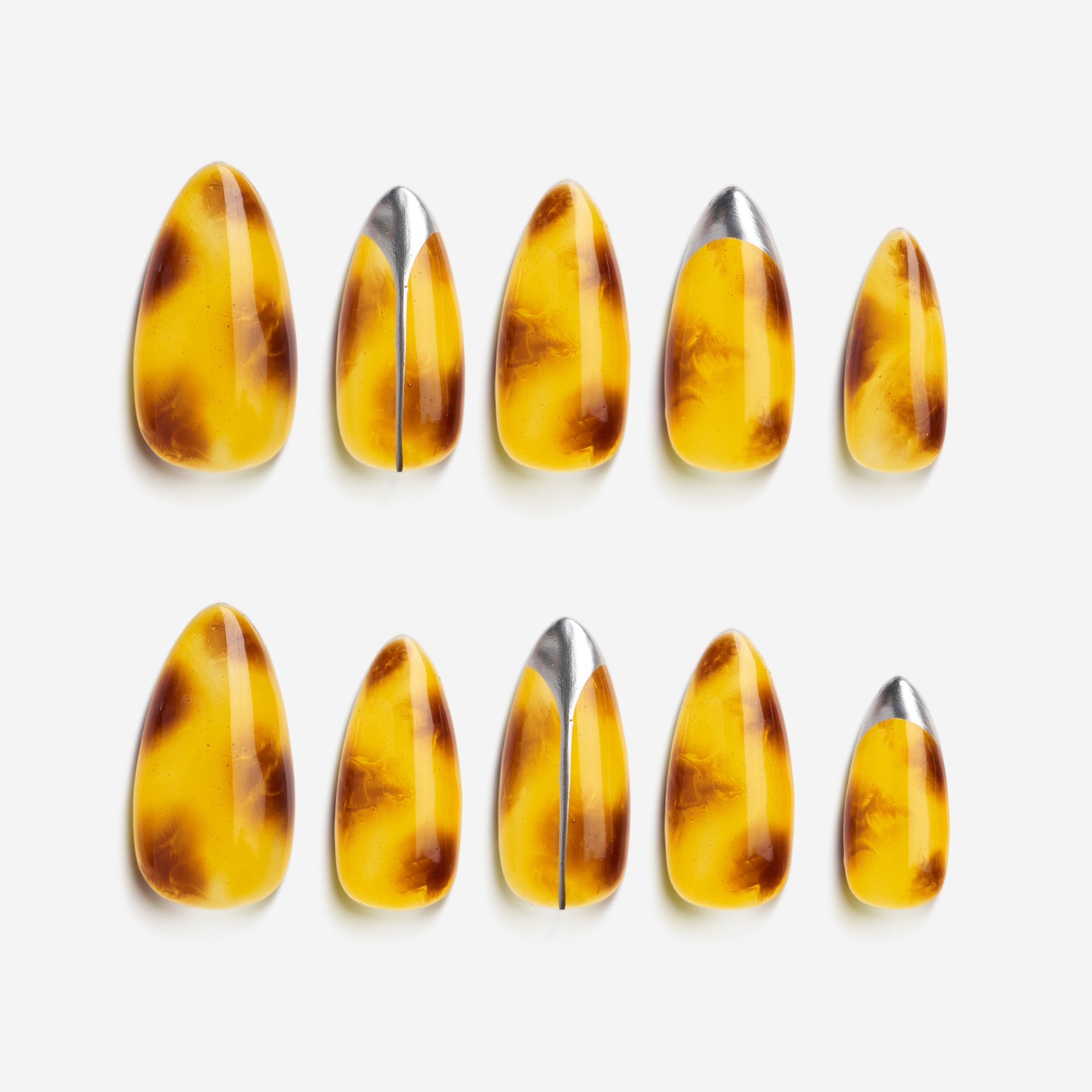 Amber-brown tortoiseshell press on nails with metallic silver accents and glossy finish.