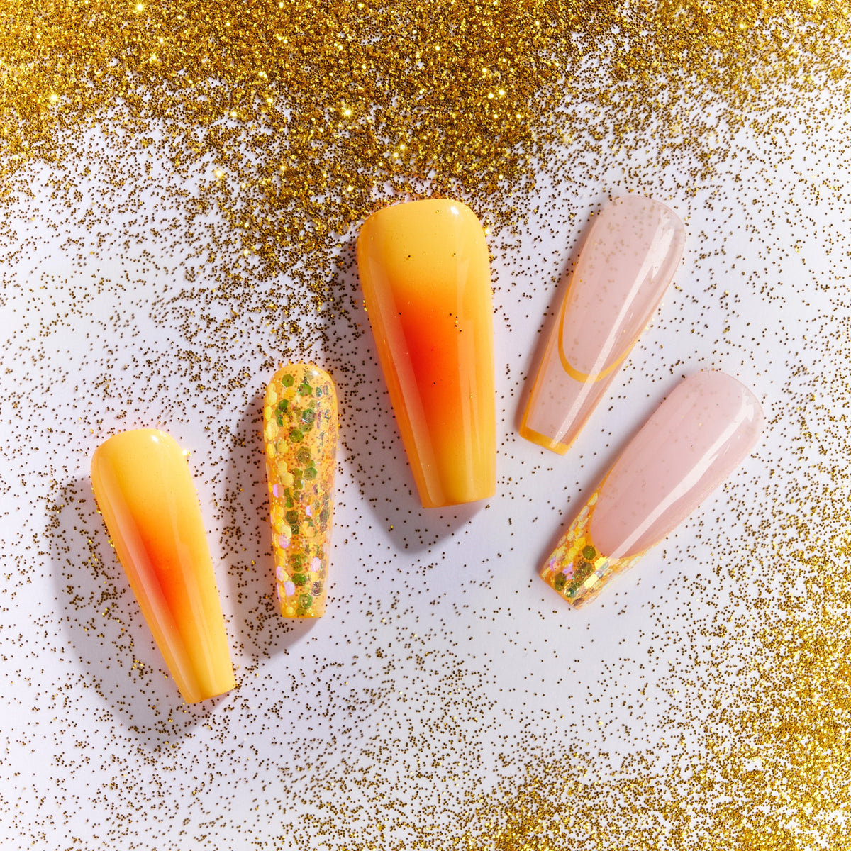 Warm amber gradient press on nails inspired by sunset tones. Glossy, elegant and reusable.