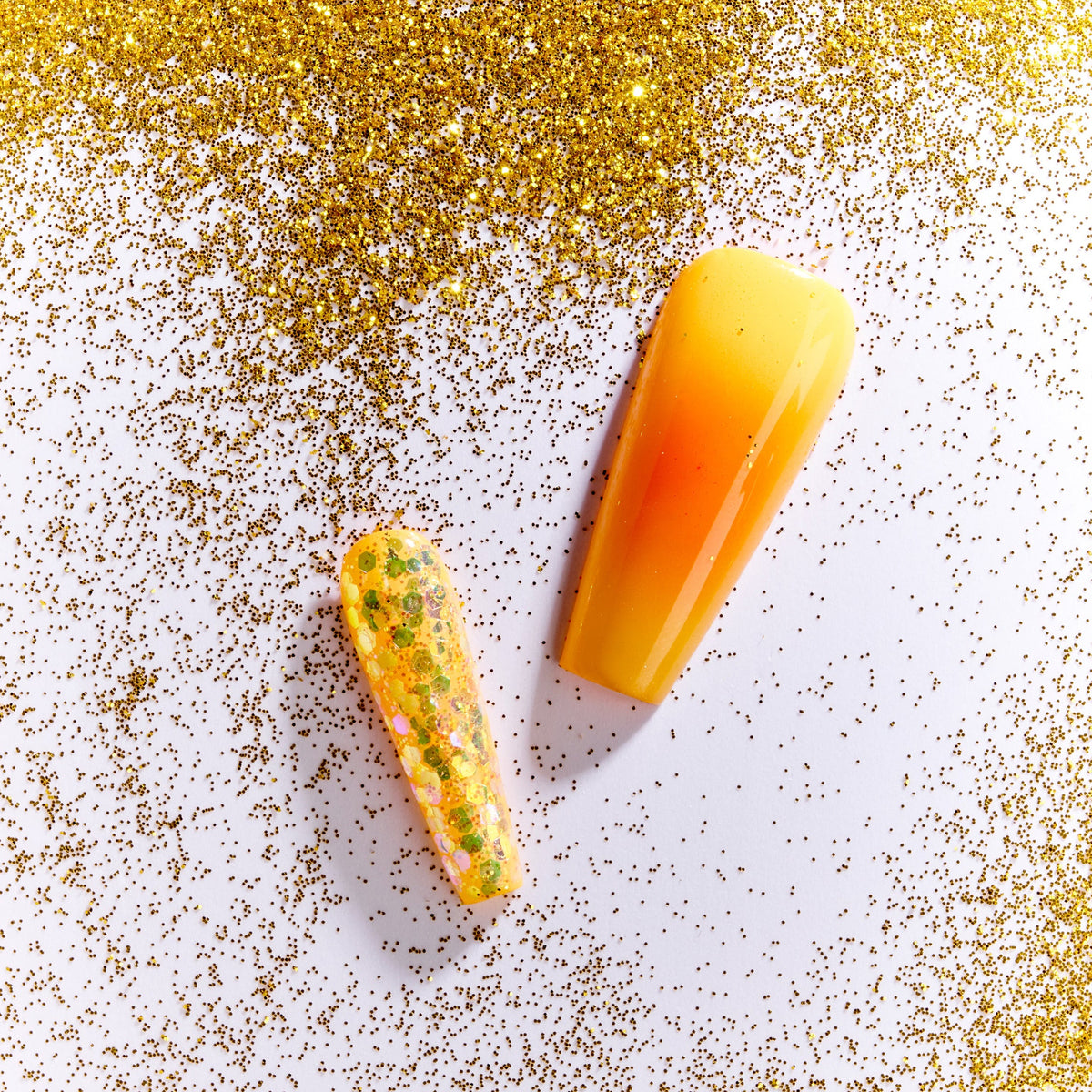 Warm amber gradient press on nails inspired by sunset tones. Glossy, elegant and reusable.