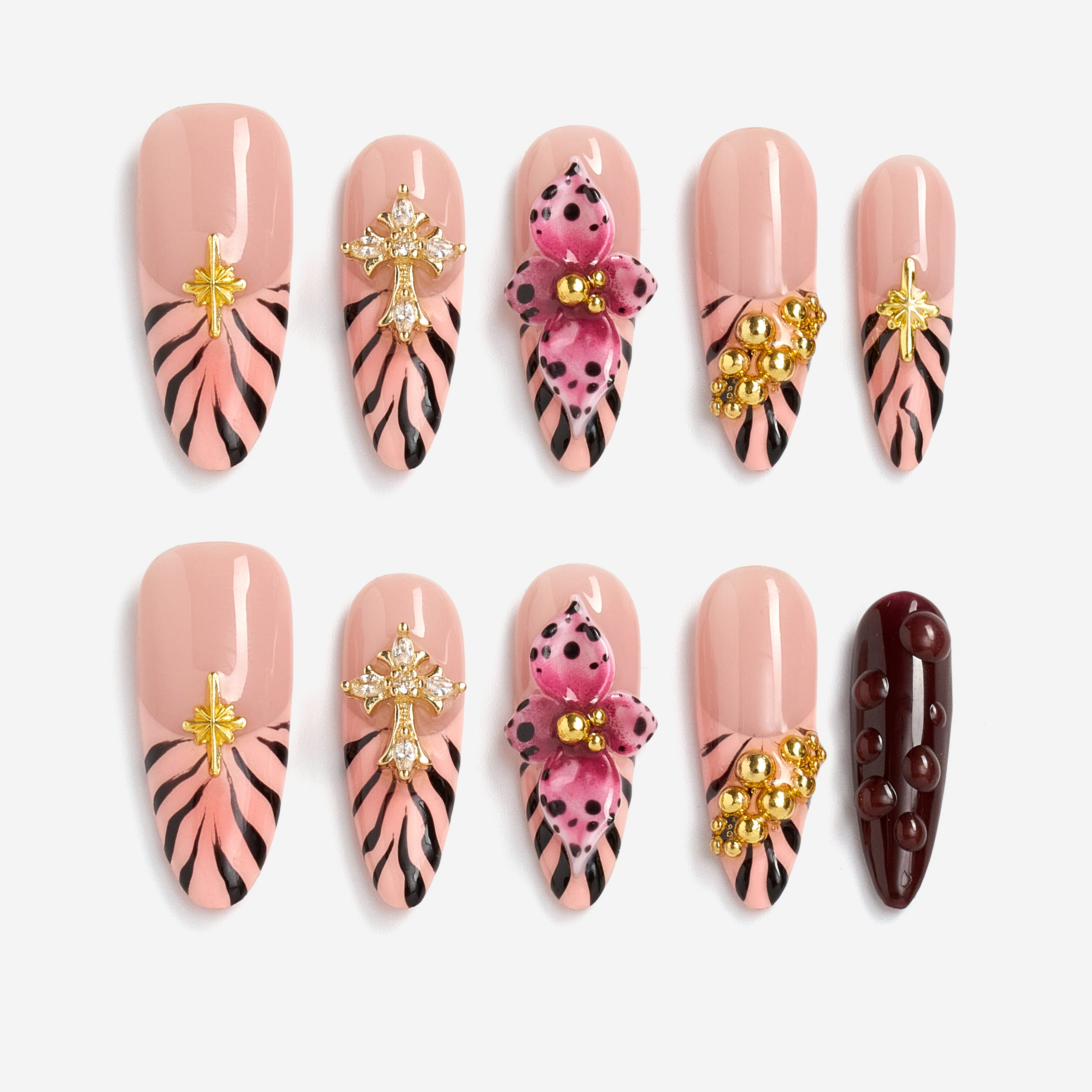 Warm neutral press on nails with gold and crystal details. Handmade reusable nail art set for everyday elegance.