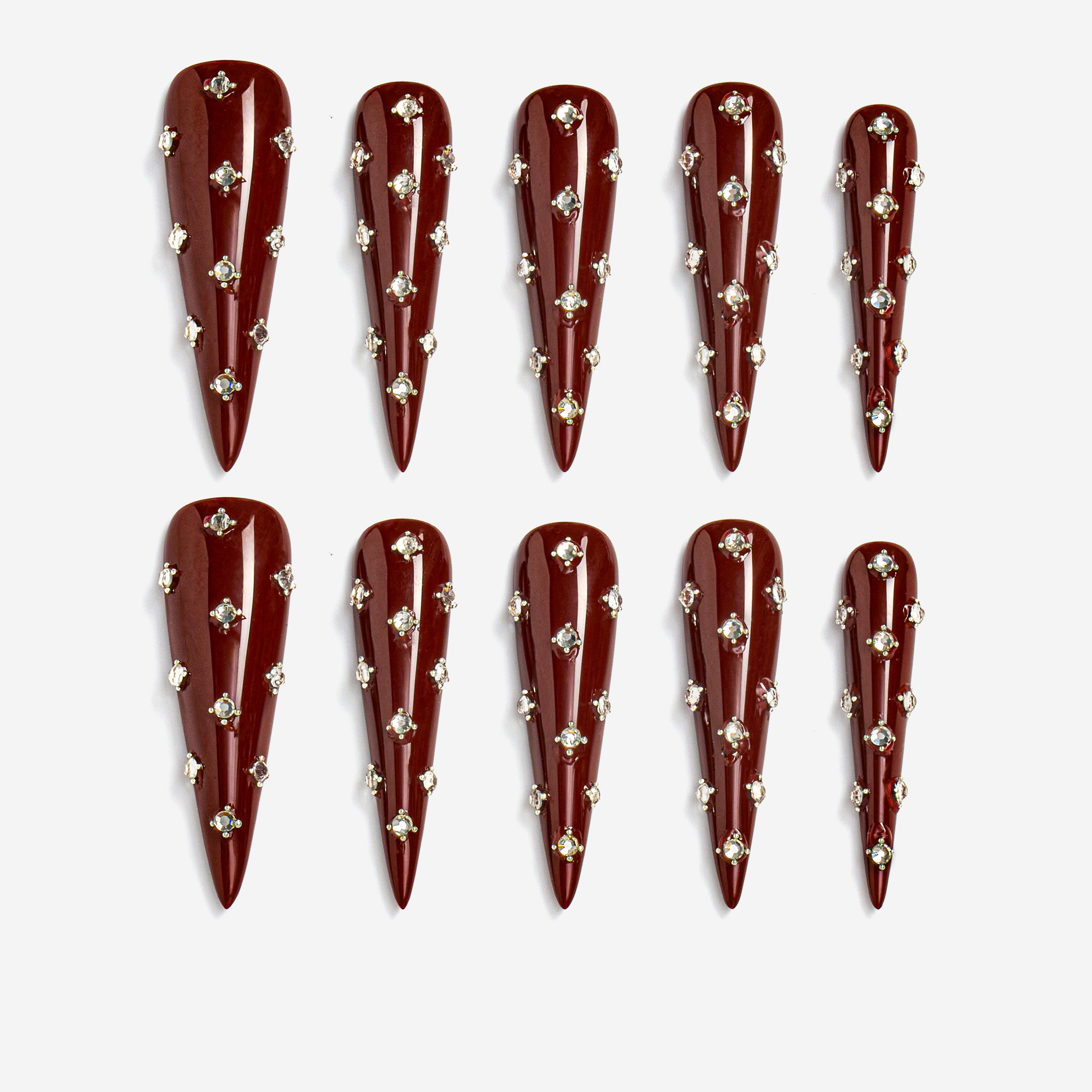 Deep burgundy long press on nails with crystal accents. Elegant reusable statement nail set.