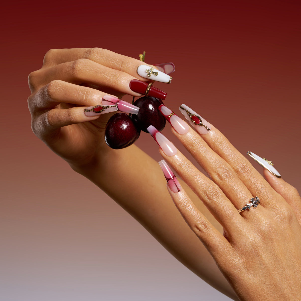 Cold toned coffin press on nails featuring silver chrome waves and blue gradient accents. Futuristic, glossy and reusable.