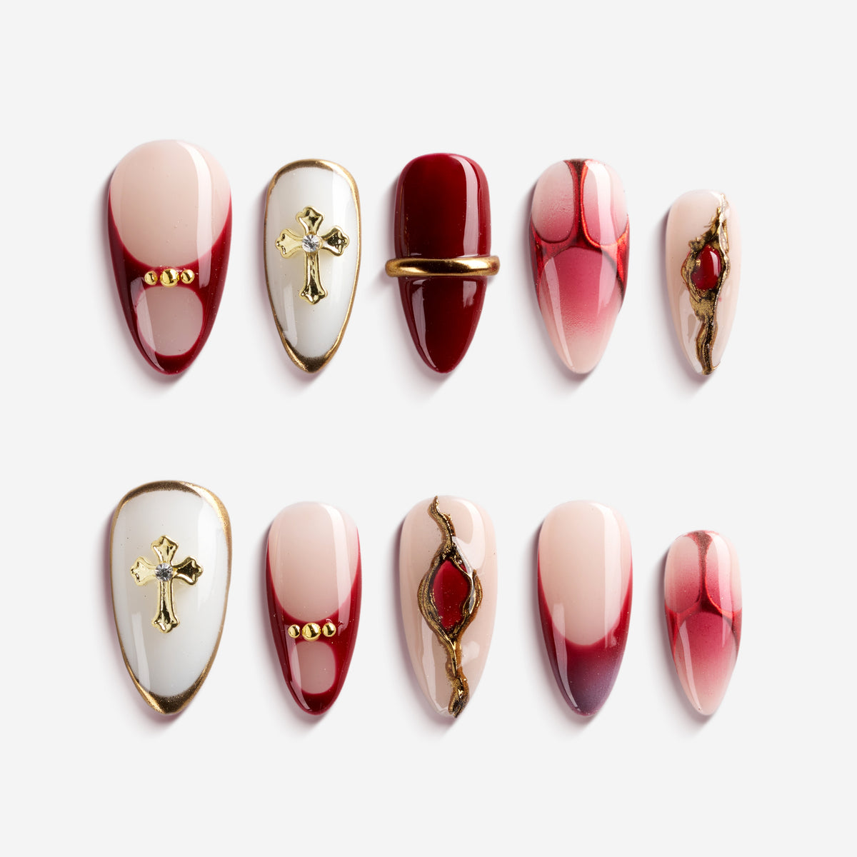 Bold red coffin press on nails with gold cross accents and gradient finish. Dramatic, elegant and reusable.