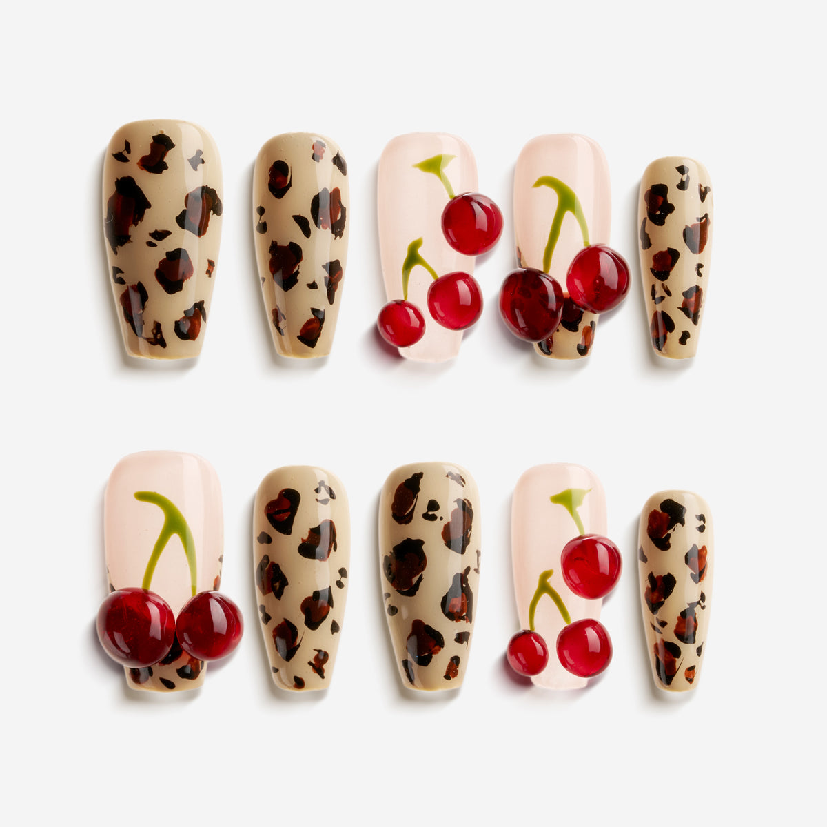 Coffin press on nails with cherry art and brown leopard print on nude and pink base