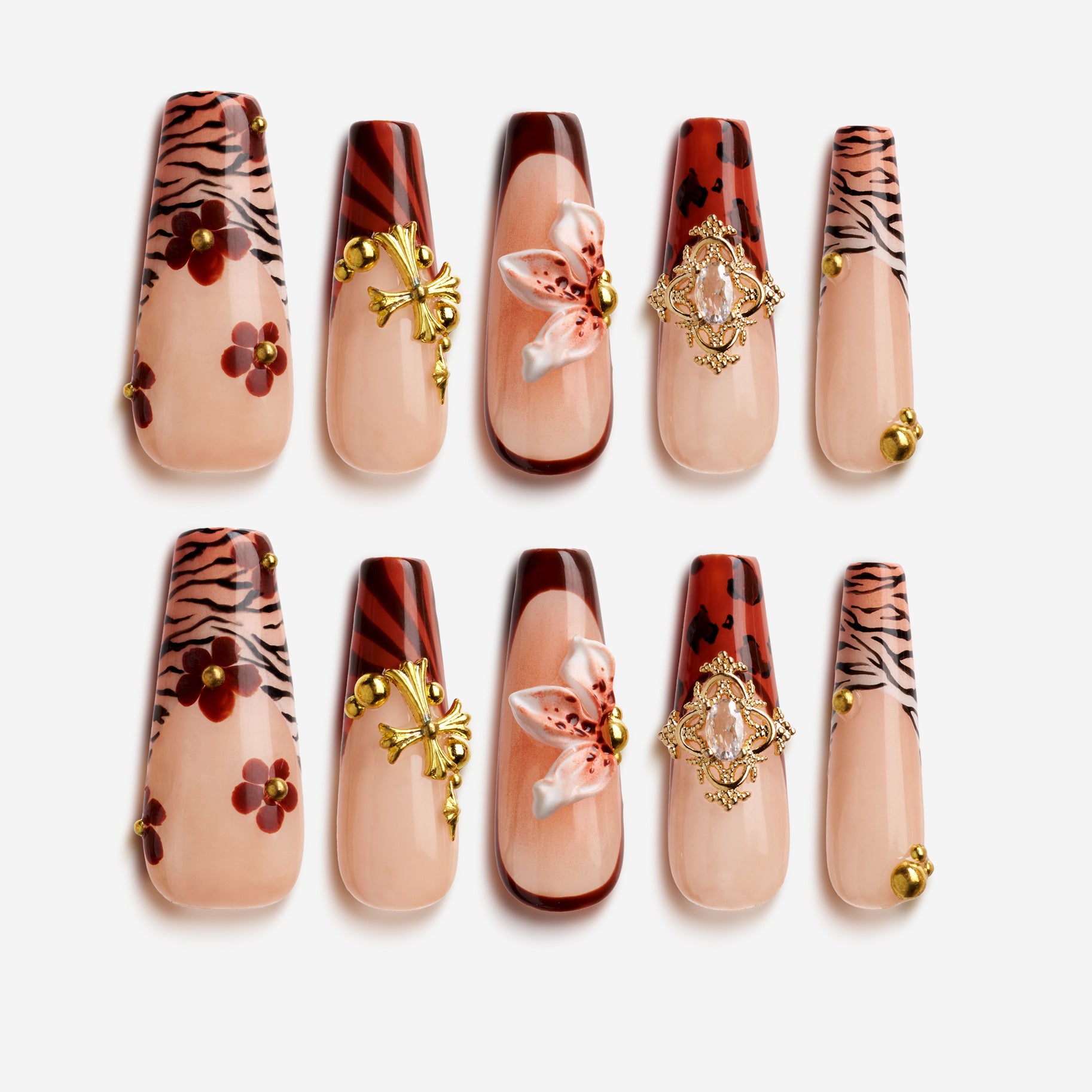 Cherry Amber press on nails with warm nude tones and cherry accents