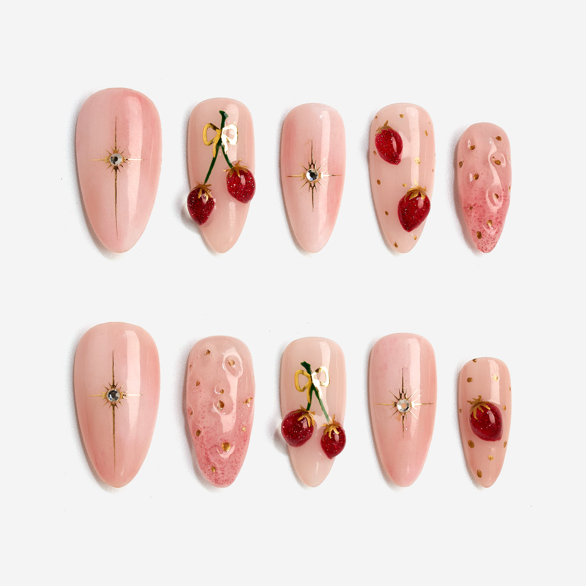 Short cherry press on nails with glossy shine and gold accents. Cute, stylish and reusable.
