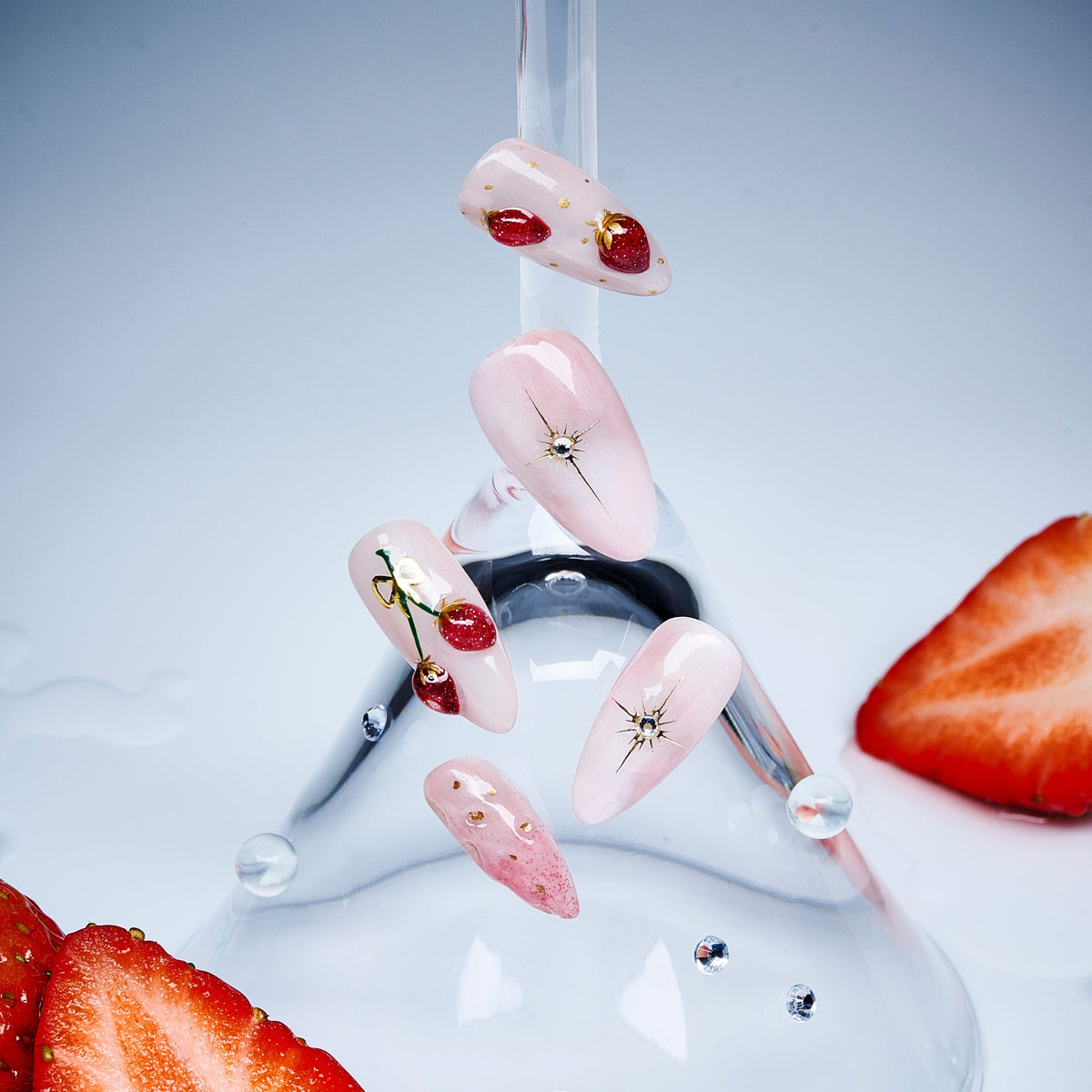 Short cherry press on nails with glossy shine and gold accents. Cute, stylish and reusable.