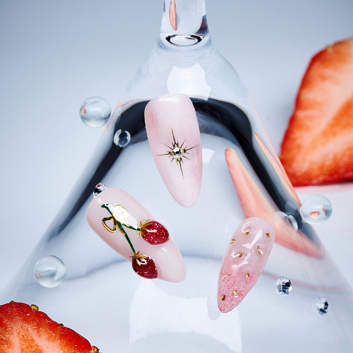 Short cherry press on nails with glossy shine and gold accents. Cute, stylish and reusable.