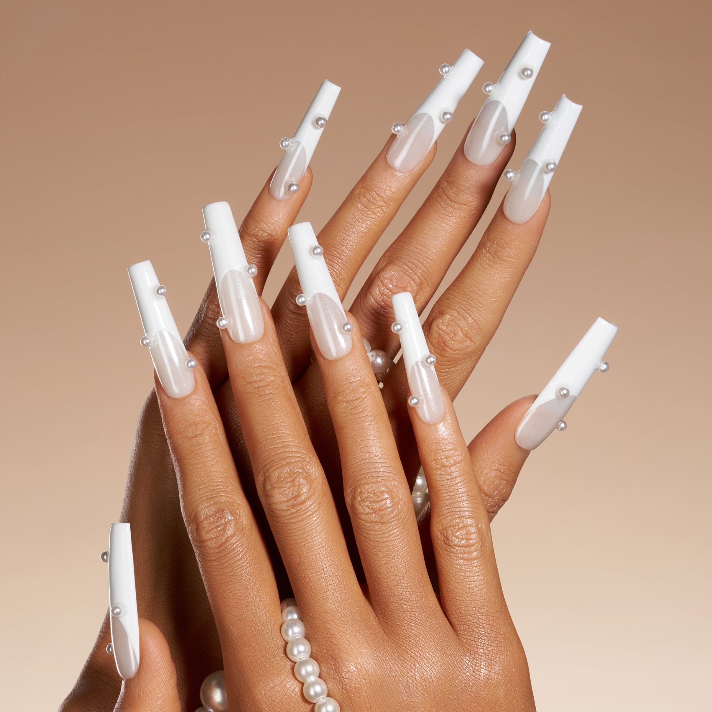 Cloud Porcelain Drop press on nails with milky base and pearl accents