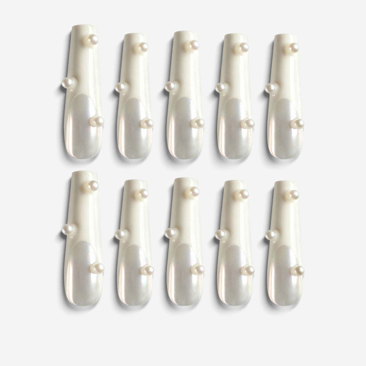 Cloud Porcelain Drop press on nails with milky base and pearl accents