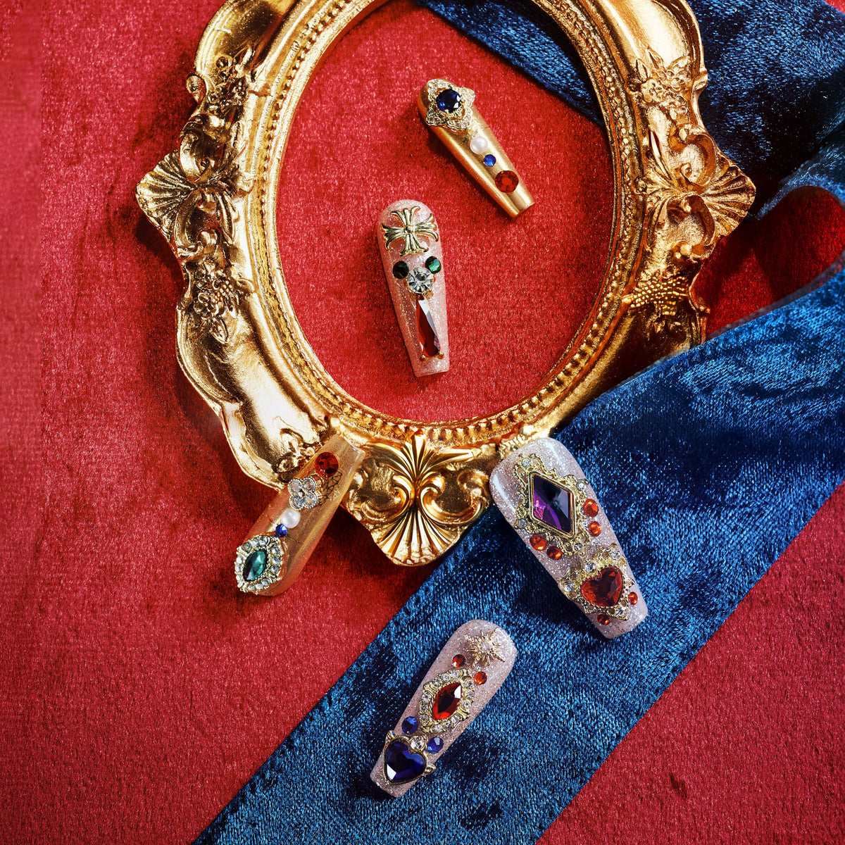 Royal-inspired luxury press on nails with ornate gemstone details. Handmade reusable nail art set with elegant impact.