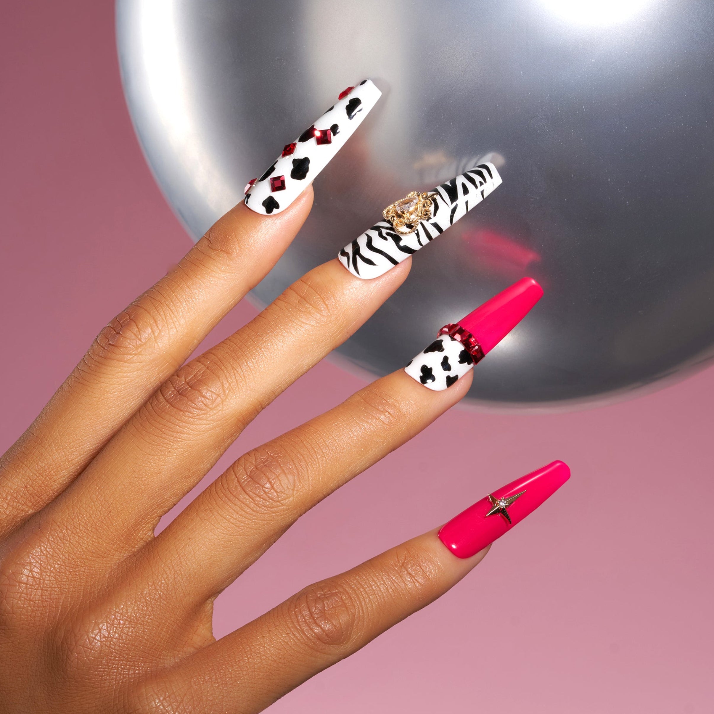 Soft nude and white press on nails with pearl chains and butterfly design. Elegant and reusable.