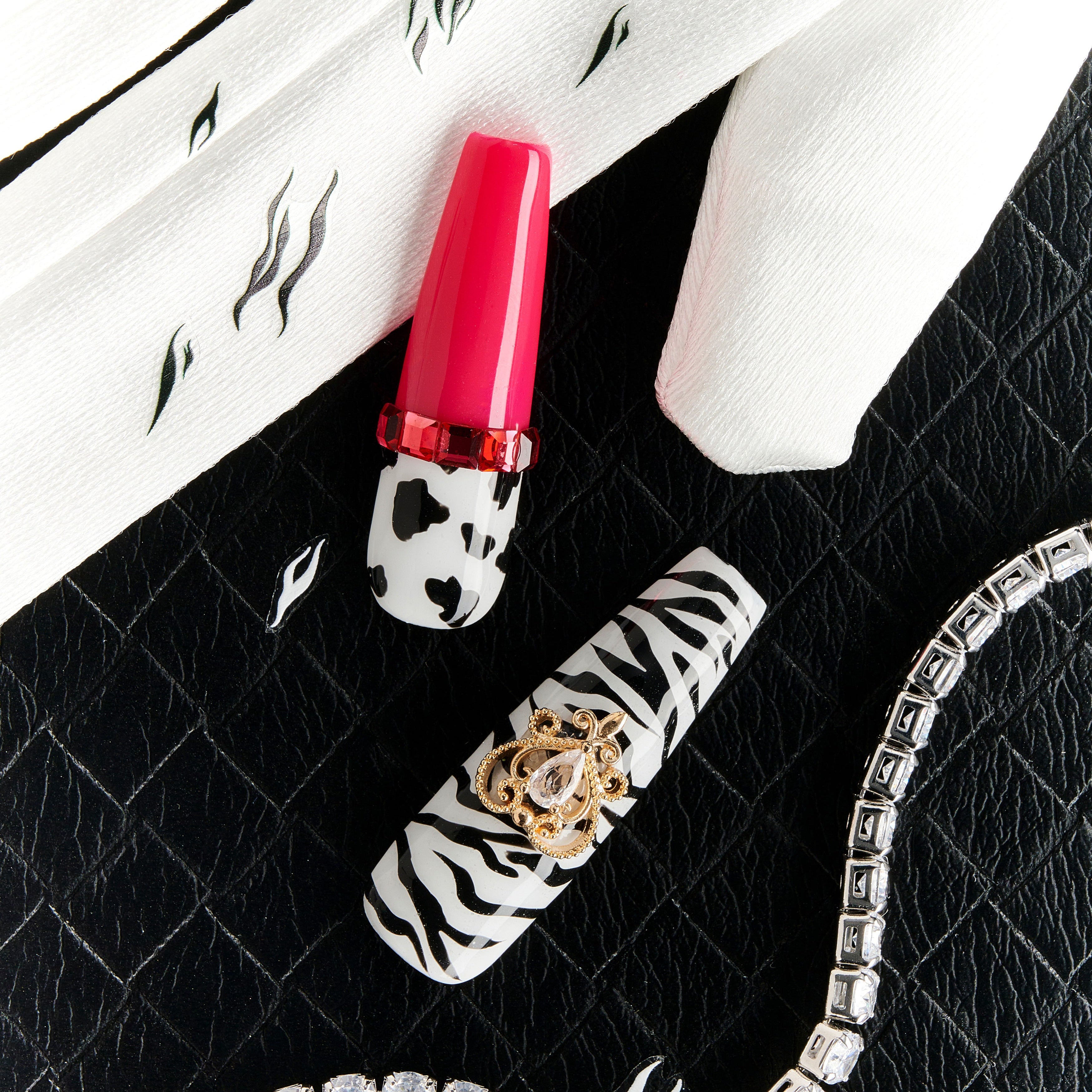 Soft nude and white press on nails with pearl chains and butterfly design. Elegant and reusable.