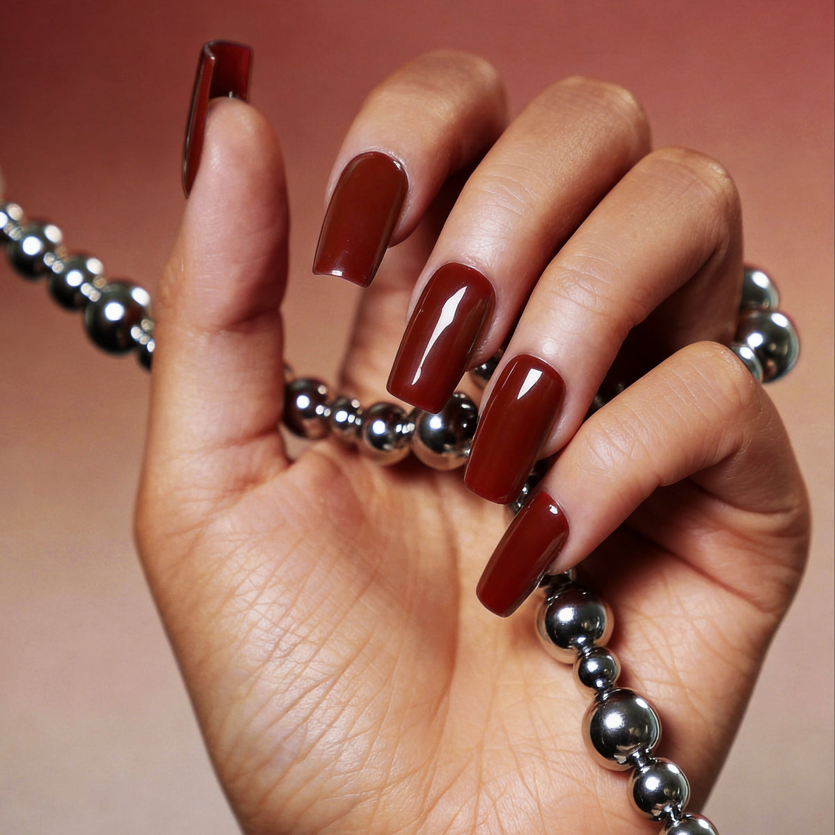 Crimson Temptation glossy red press on nails. Bold, rich statement false nails for glam nights.