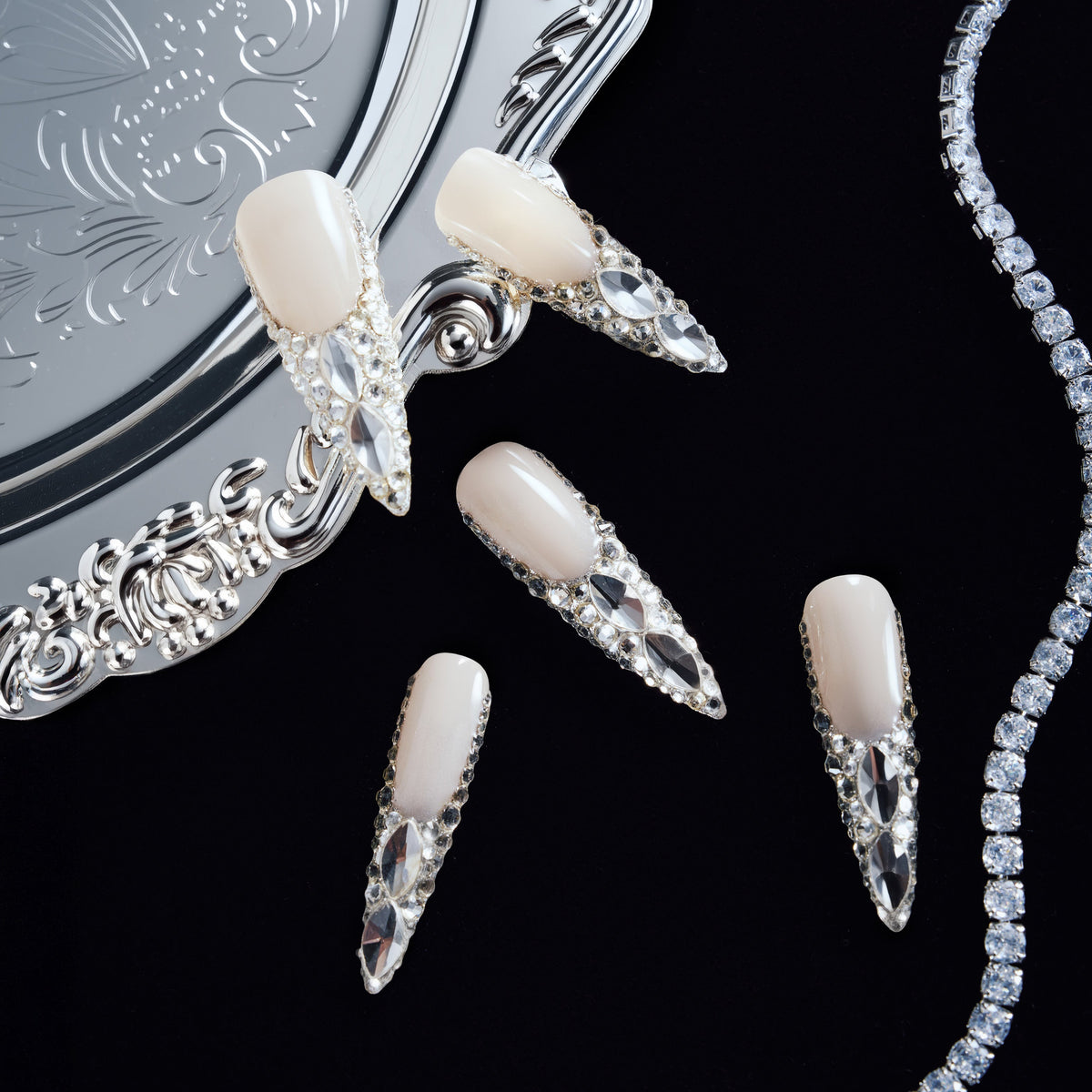 Crystal Wings luxury long press on nails with silver crystals arranged in wing patterns