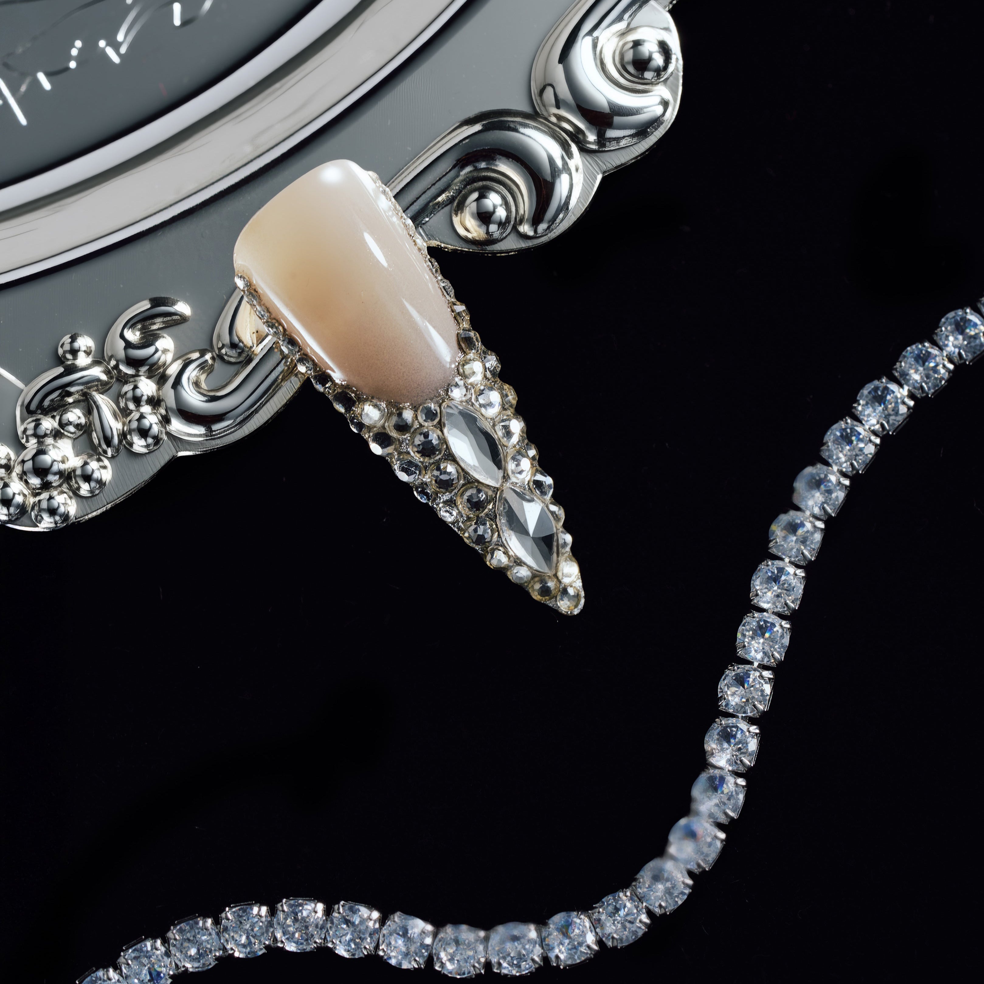 Crystal Wings luxury press on nails featuring premium Swarovski® crystals. Handmade reusable nail art set with dramatic shine and elegant nude base.