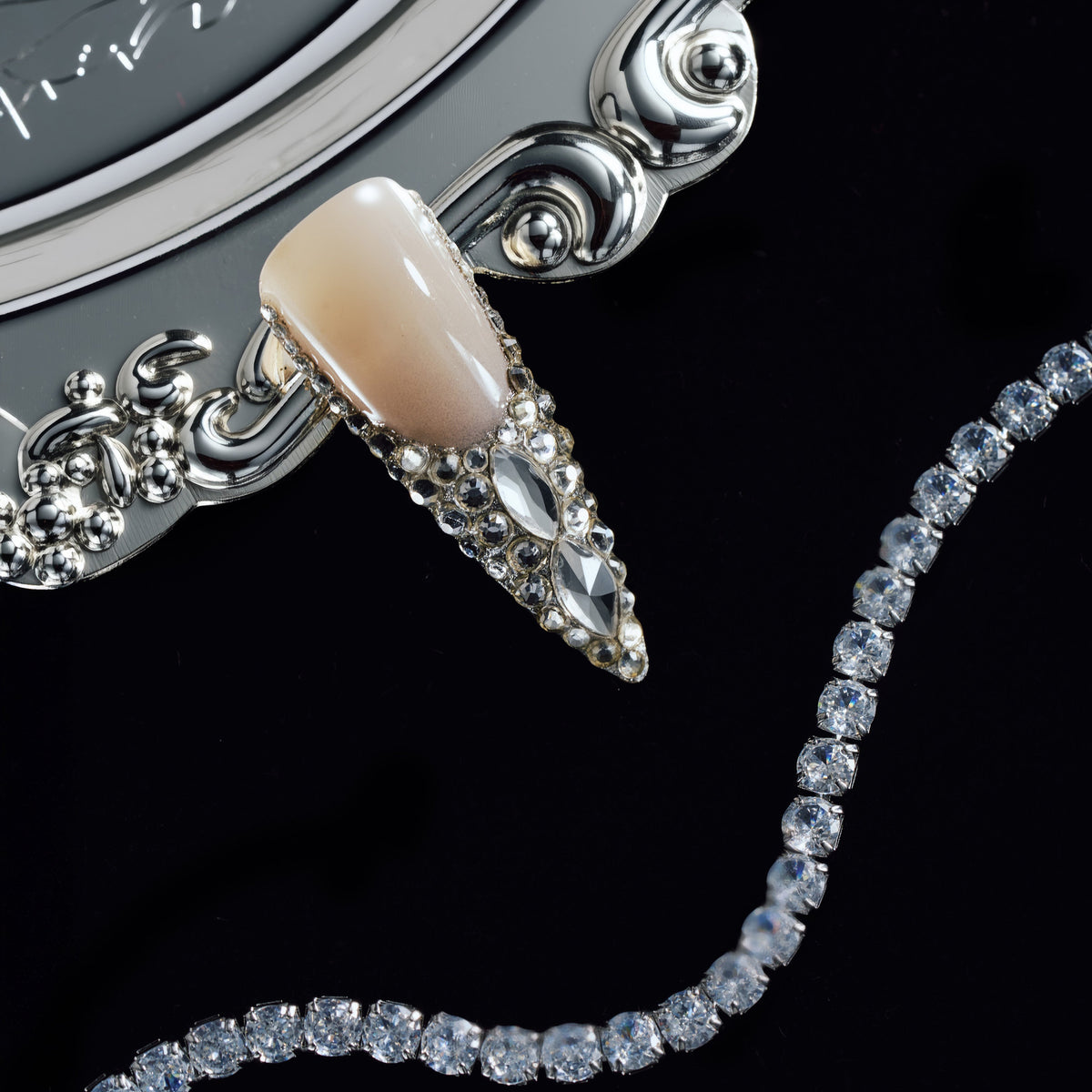 Crystal Wings luxury press on nails featuring premium Swarovski® crystals. Handmade reusable nail art set with dramatic shine and elegant nude base.