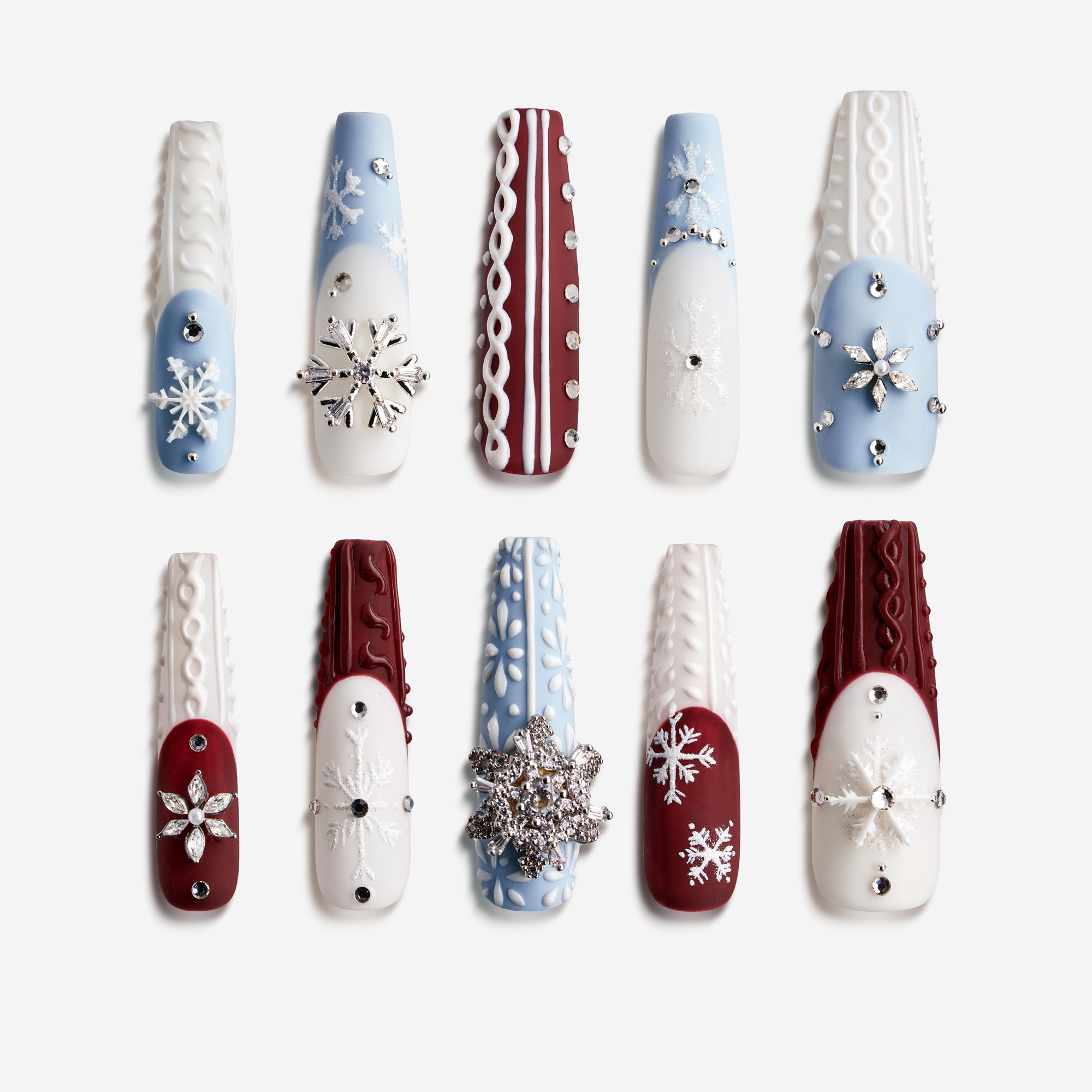 Dance of the Cosmos Christmas press on nails with 3D knit texture, snowflake charms, red and blue winter design long nail