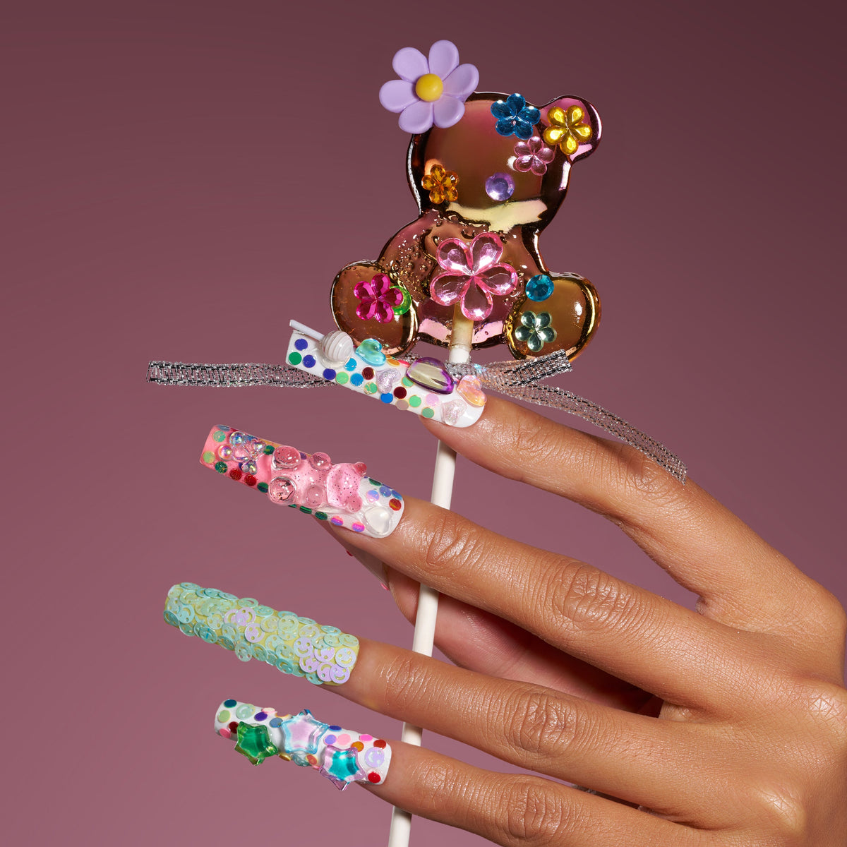 Dreamy gradient press on nails with iridescent stars and heart accents. Reusable handmade nail set.