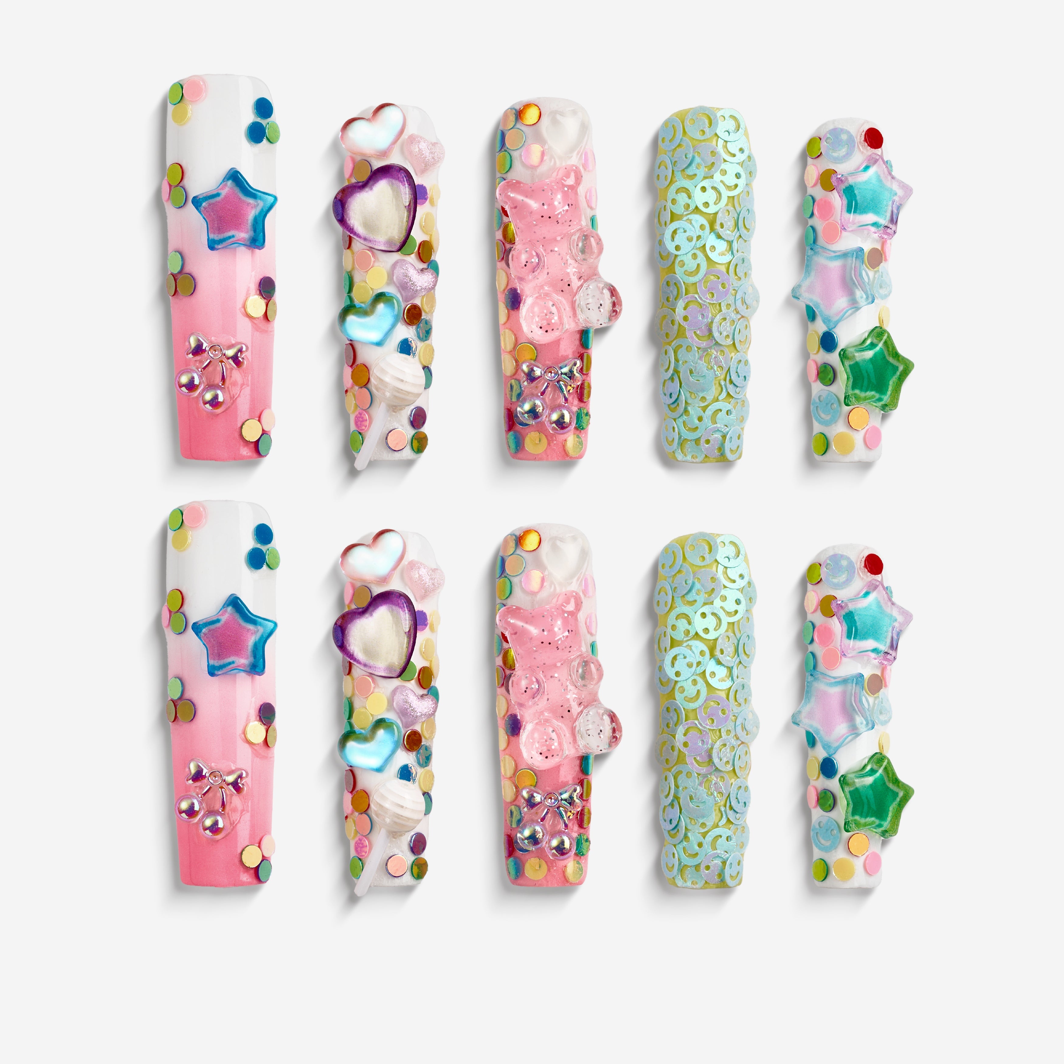 Dreamy gradient press on nails with iridescent stars and heart accents. Reusable handmade nail set.